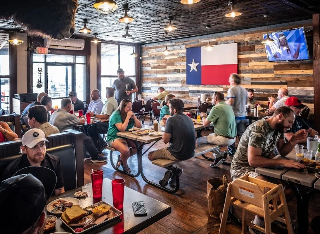 Delicious gourmet burger with fresh toppings on a wooden table