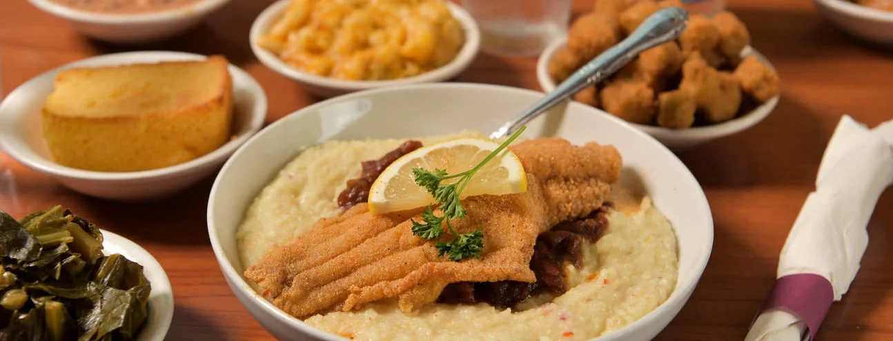 Southern fried catfish with grits and sides