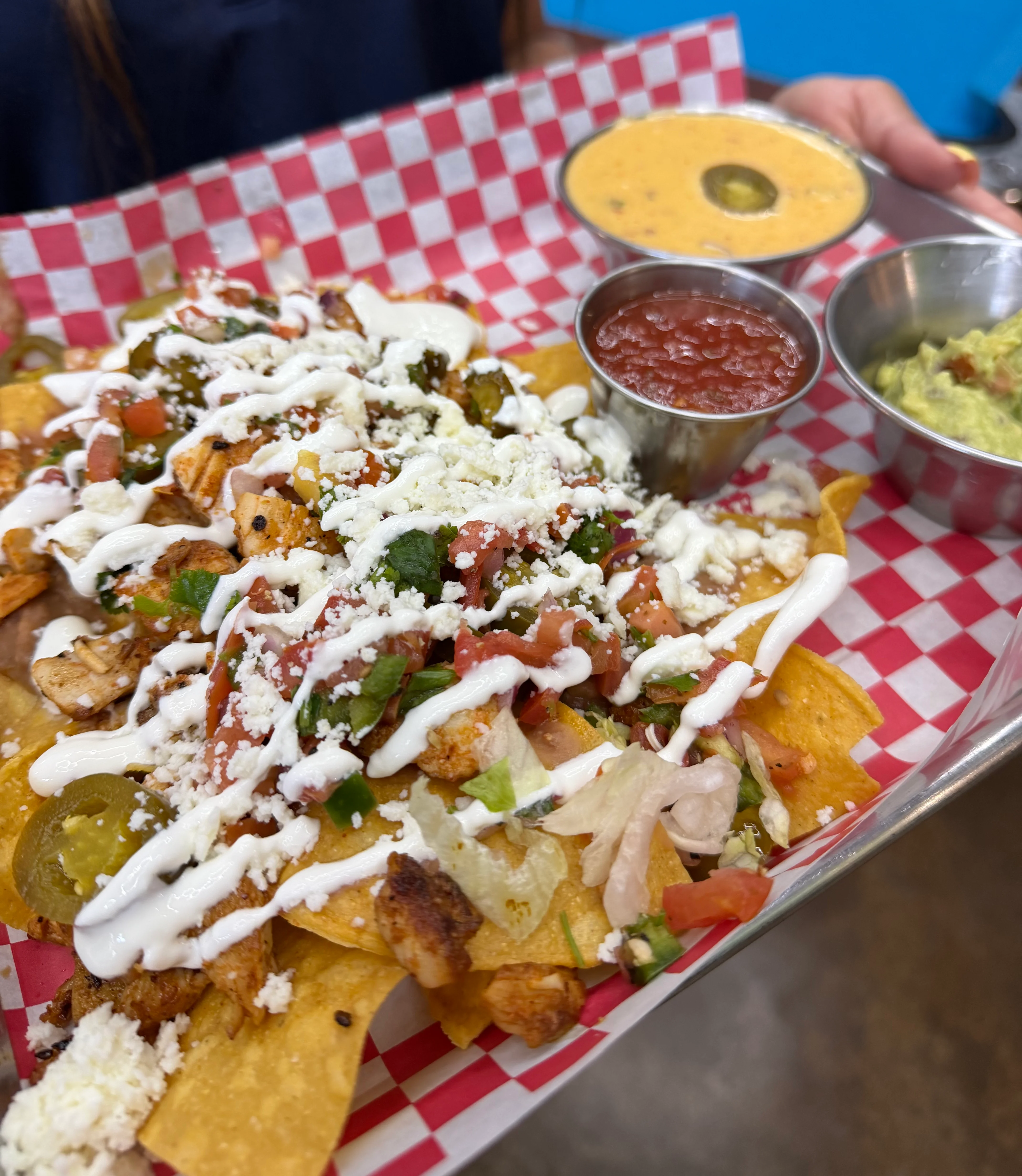 Loaded nachos with chicken and toppings