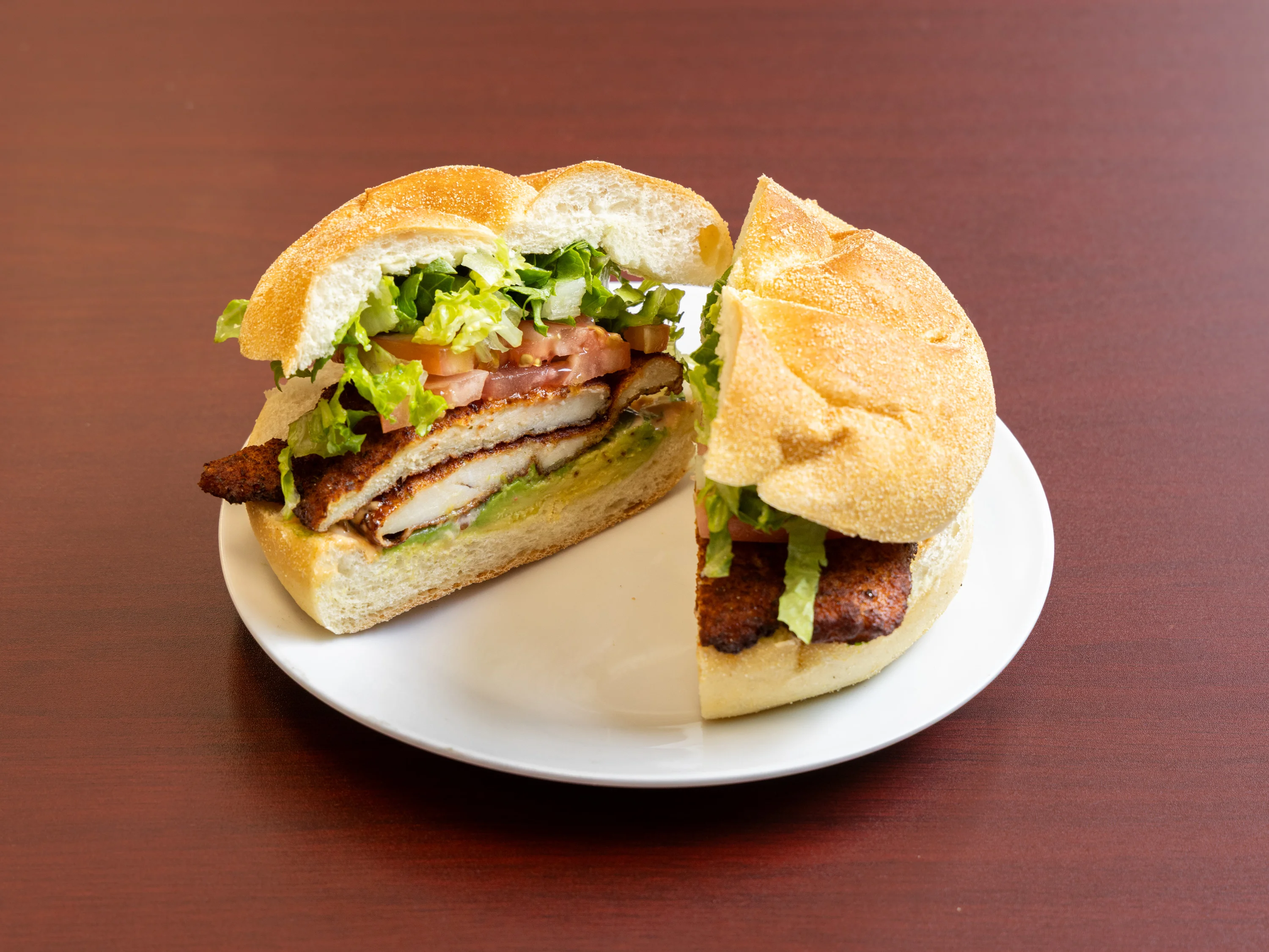 Crispy chicken sandwich with lettuce and tomato