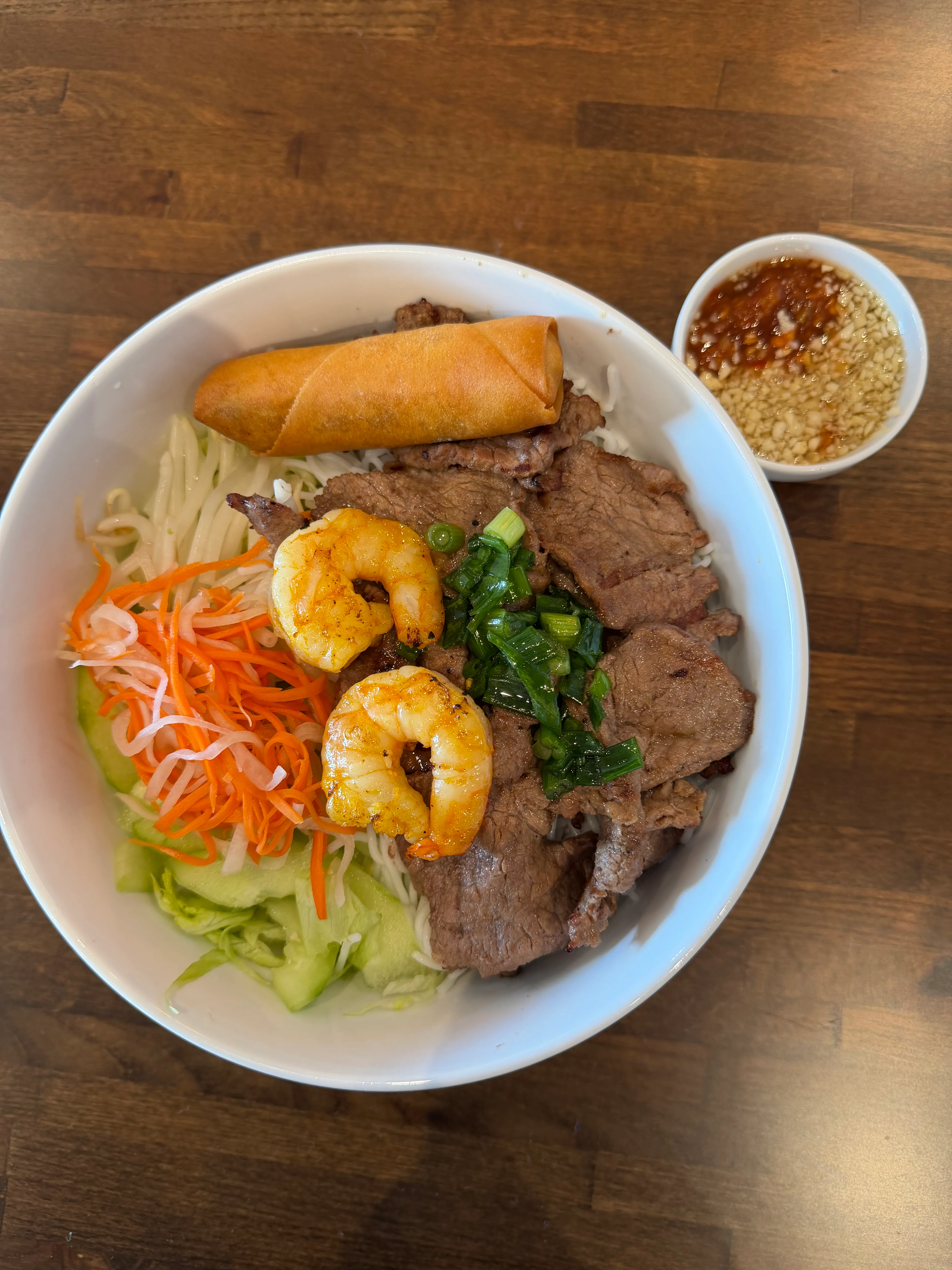 Vietnamese bun bowl with grilled shrimp and beef