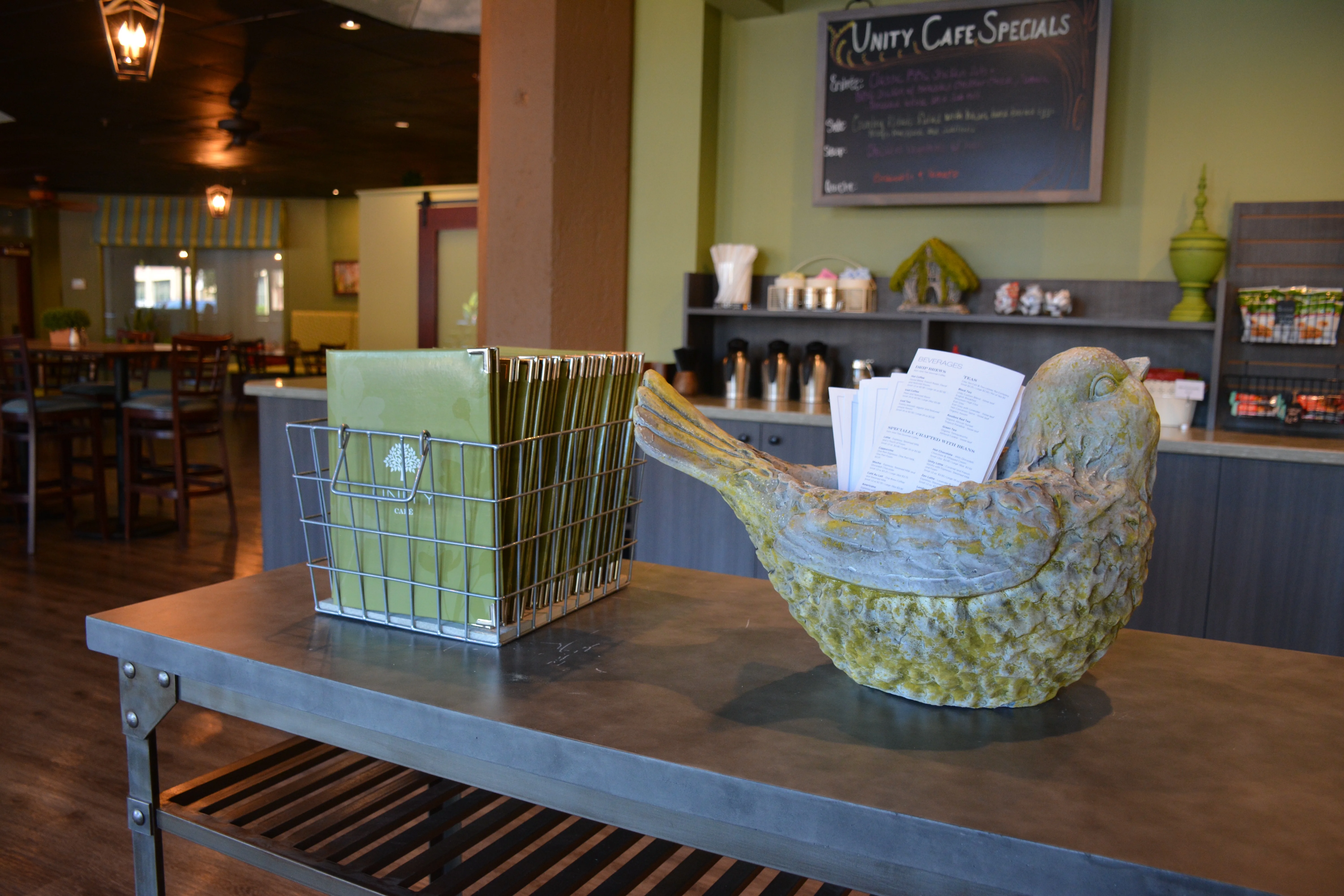 Cozy restaurant interior with menus and decorative elements