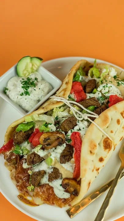 Santorini's grilled steak pita with fresh vegetables, tzatziki, and feta cheese at Station Park Farmington Utah