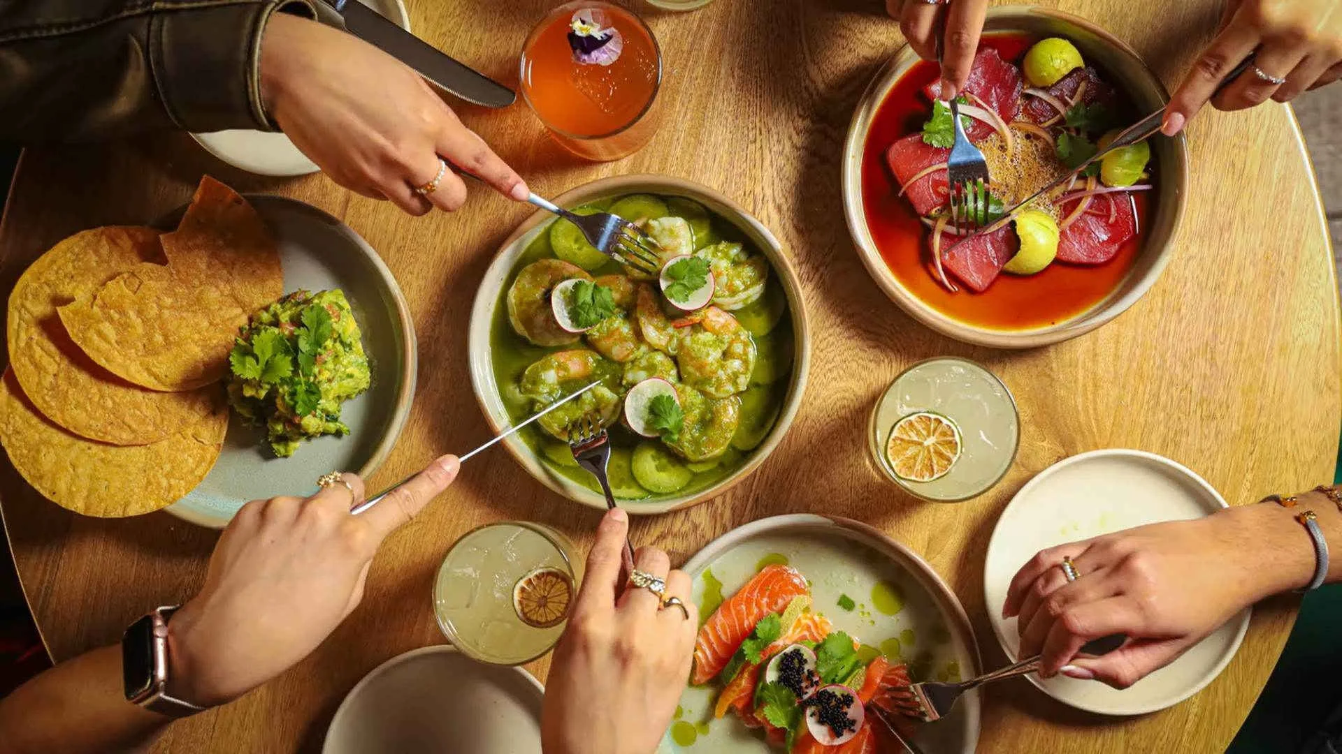 Colorful Mexican ceviche with shrimp and guacamole