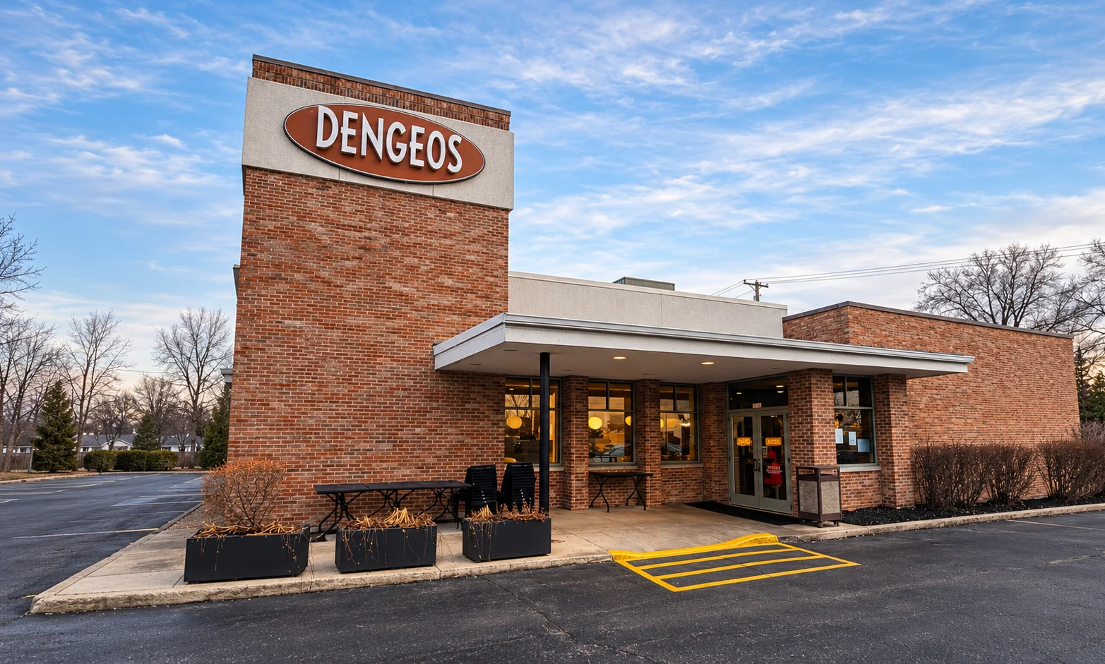 Dengeos restaurant exterior with brick facade and outdoor seating