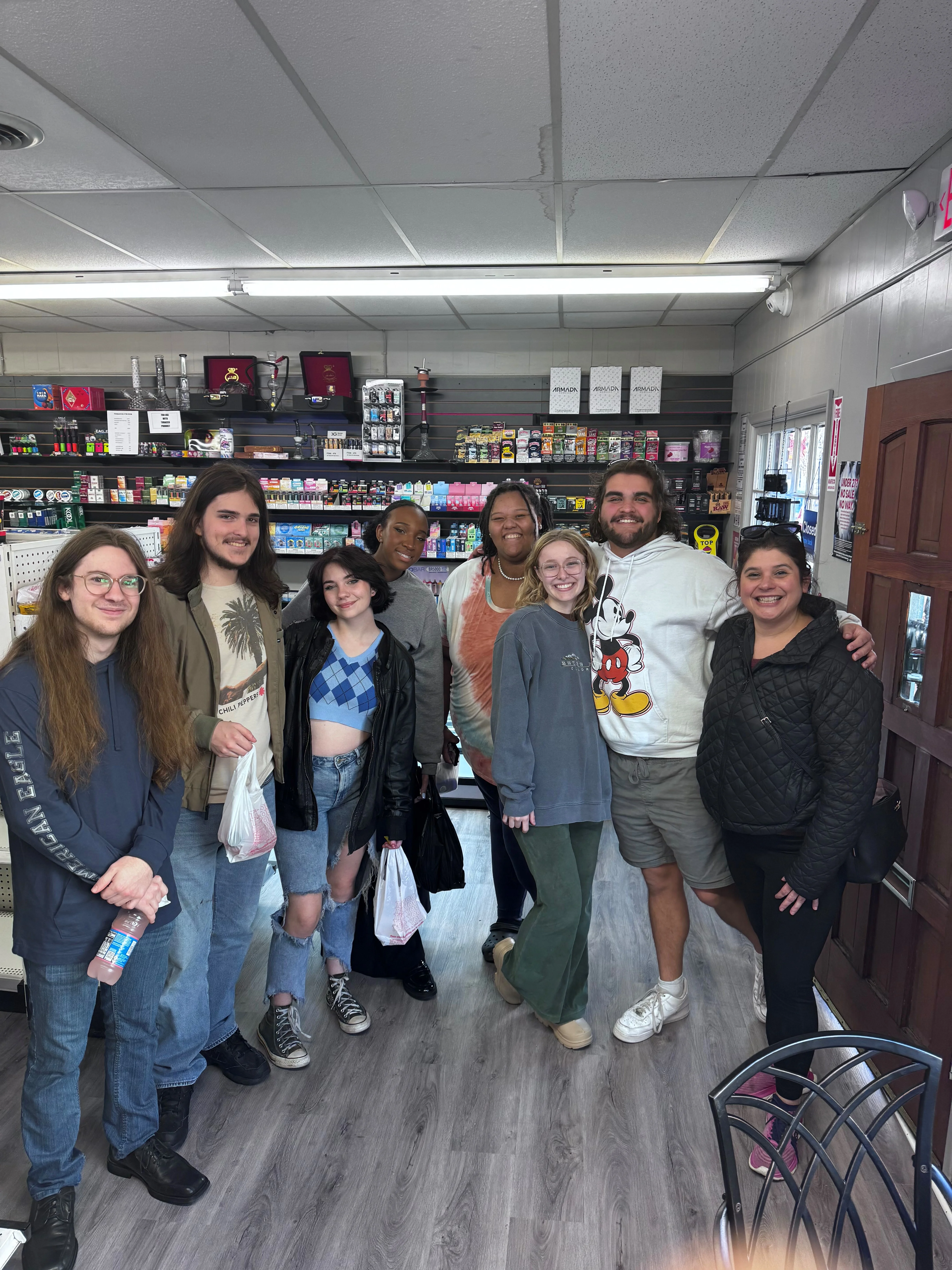Group of friends enjoying time together in a cozy shop