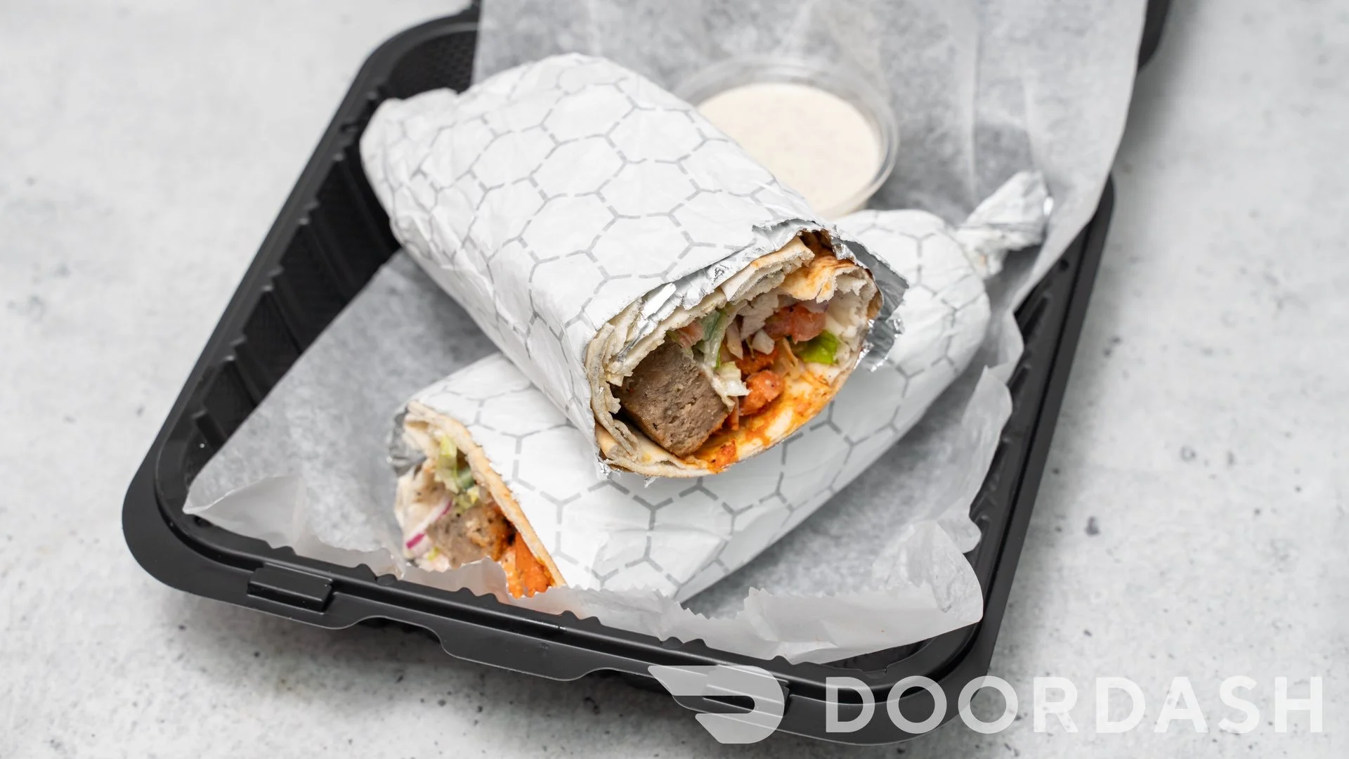 Delicious Mediterranean shawarma wrap with fresh toppings