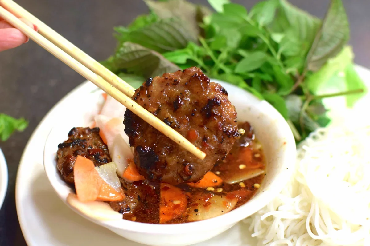 Vietnamese grilled pork meatballs with dipping sauce
