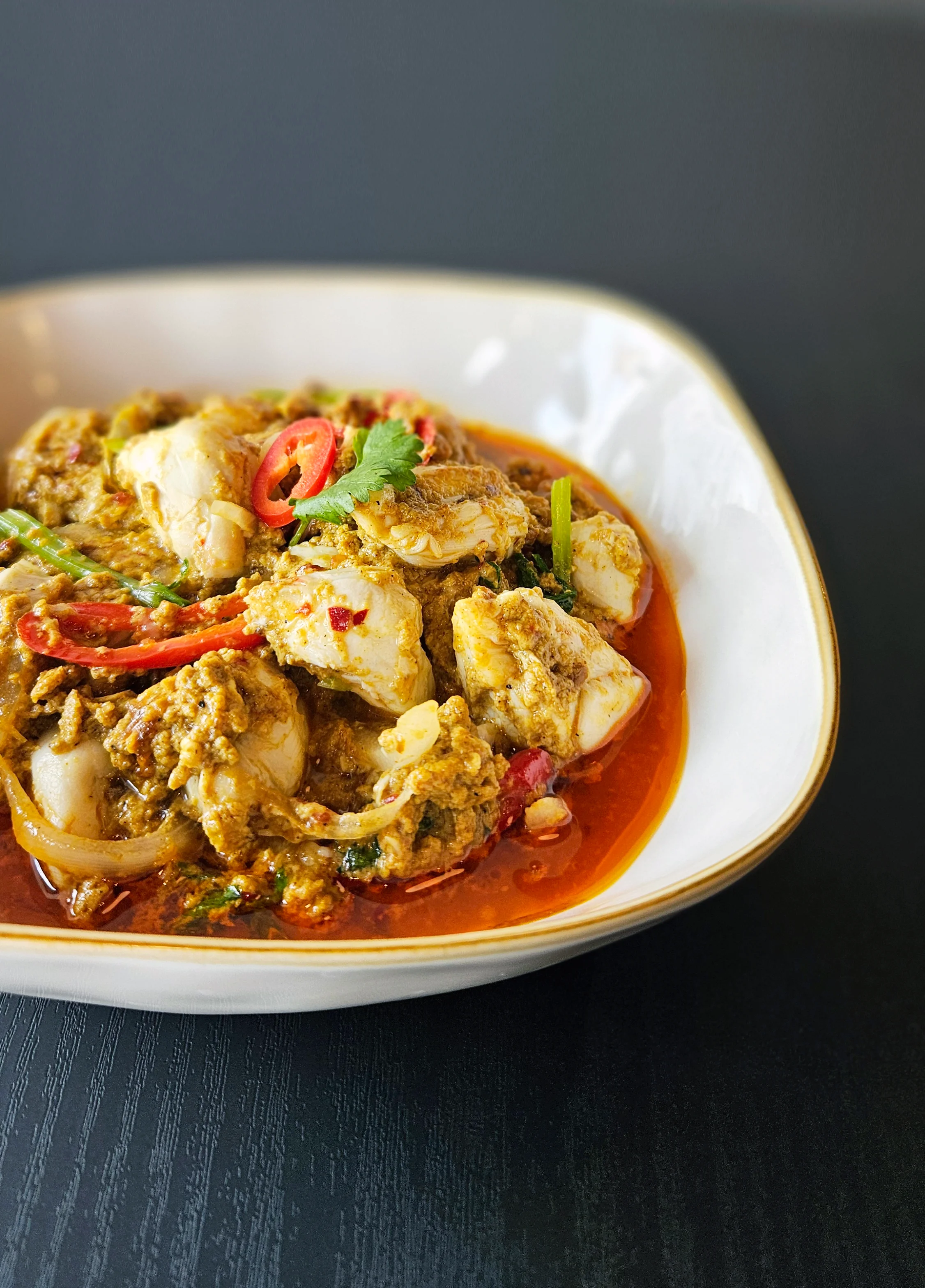 Thai green curry with fish and fresh herbs