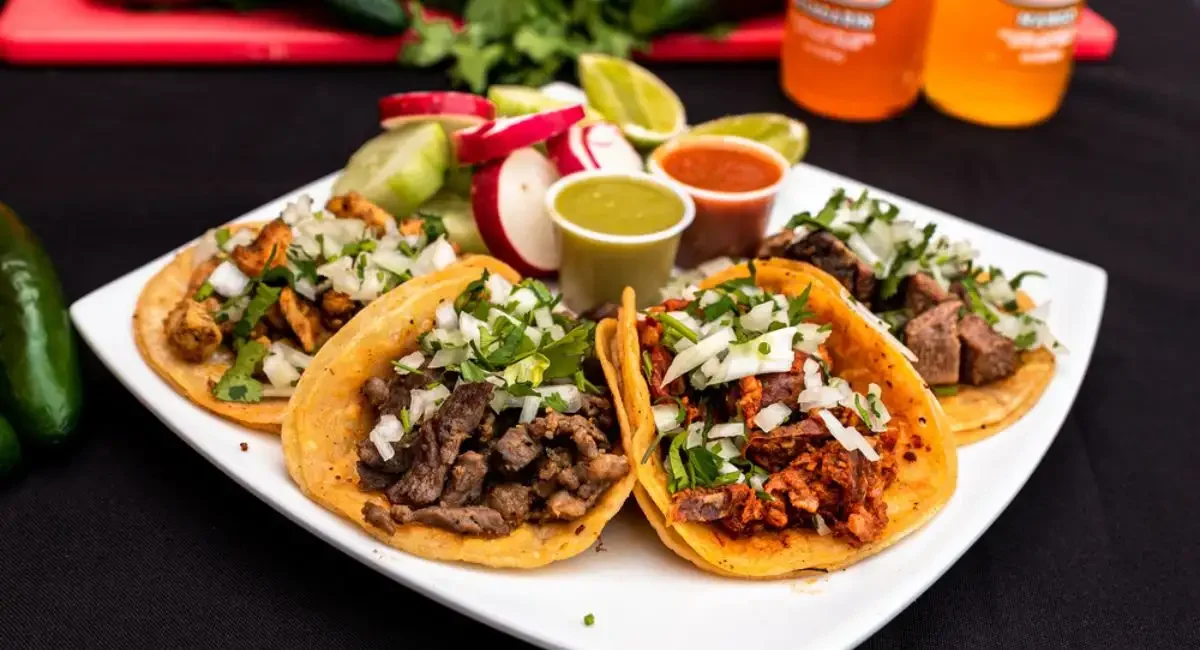 Authentic Mexican street tacos with various meats and toppings