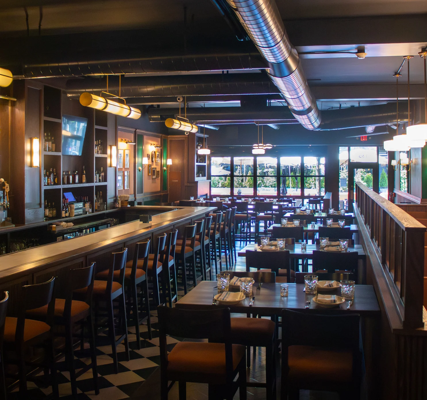Modern restaurant interior with bar and dining area