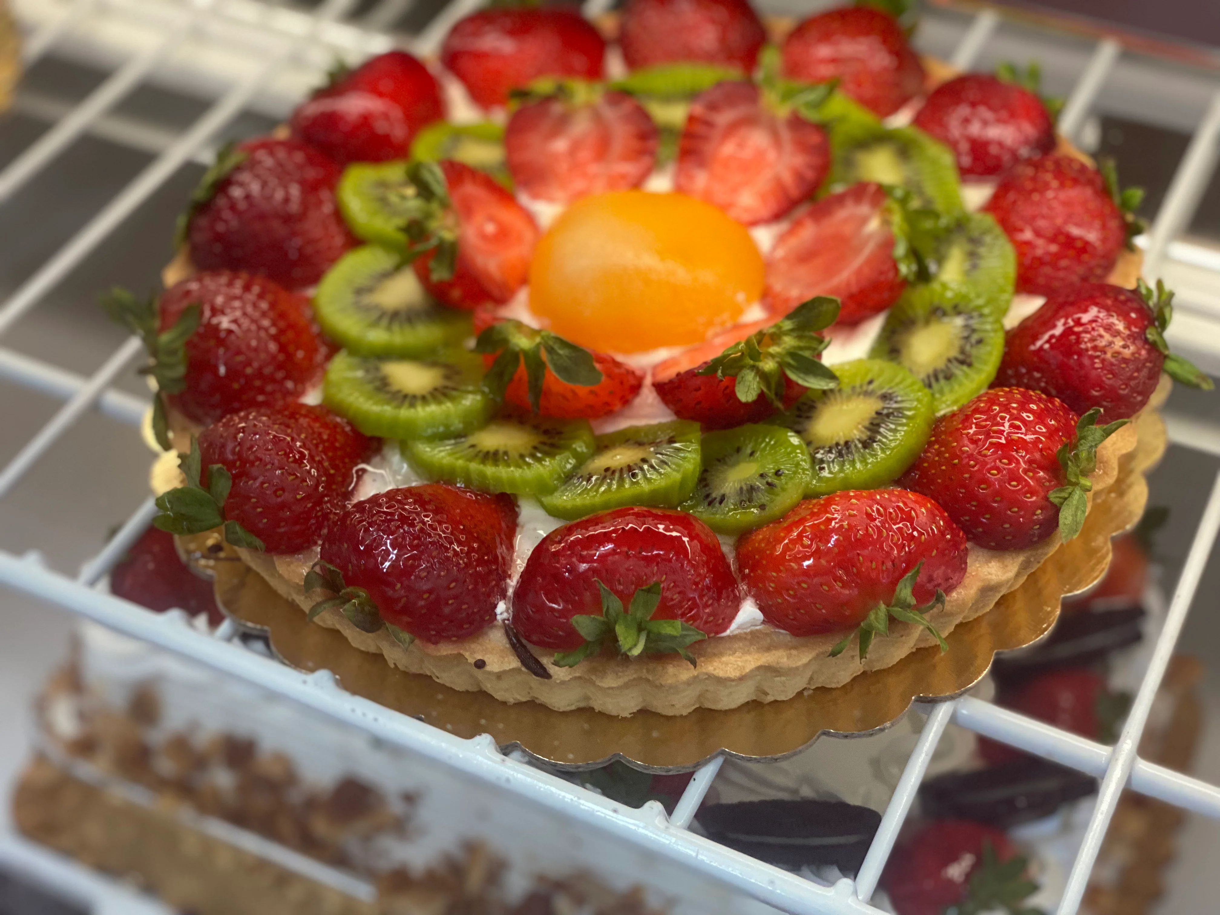 Colorful fruit tart with strawberries and kiwi