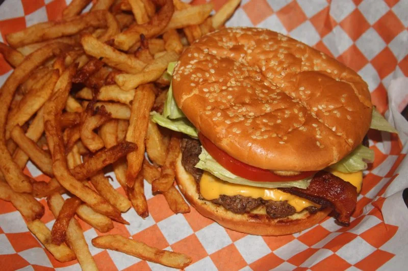 Classic American cheeseburger with fries