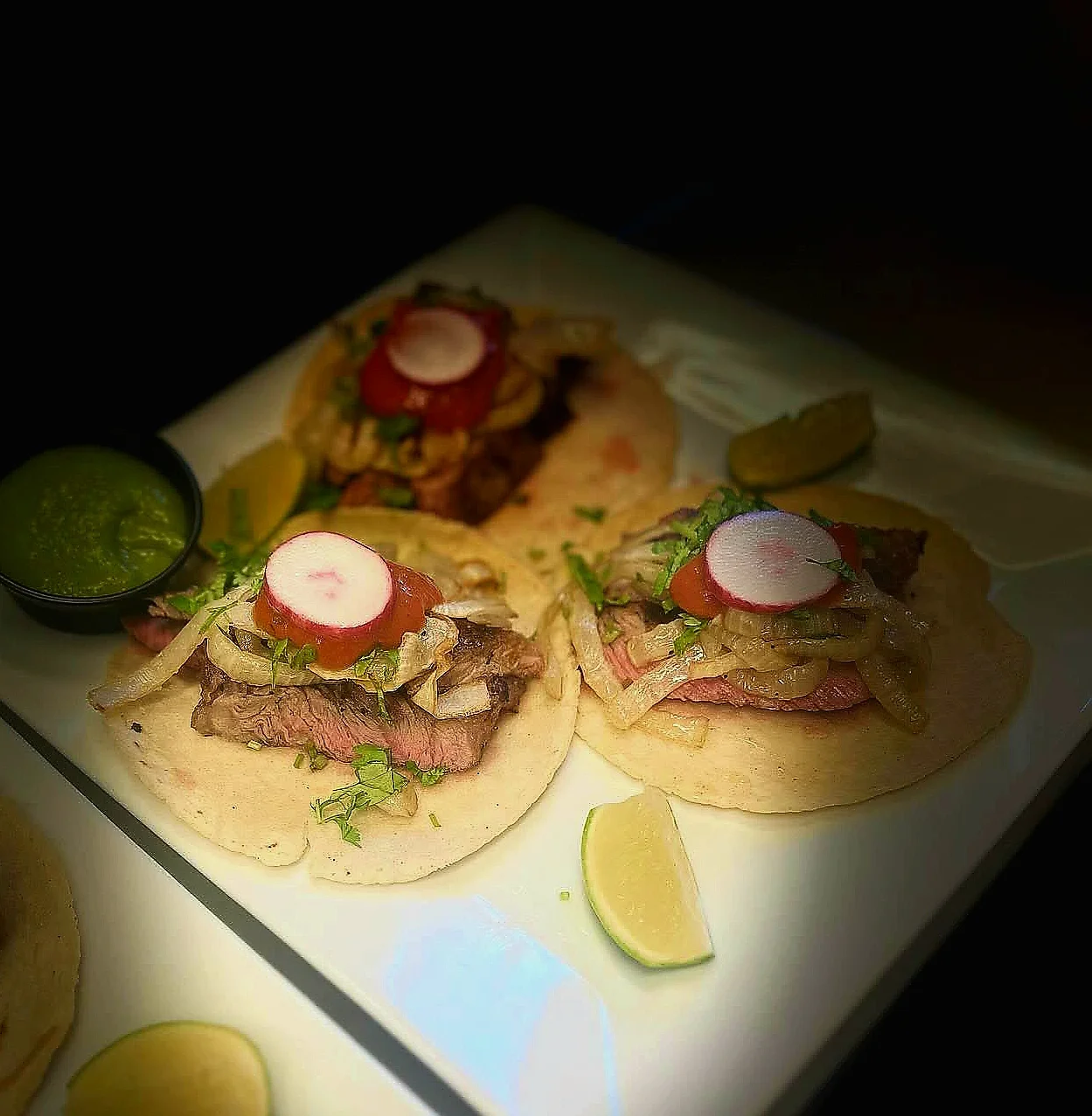 Authentic Mexican tacos with grilled beef and toppings