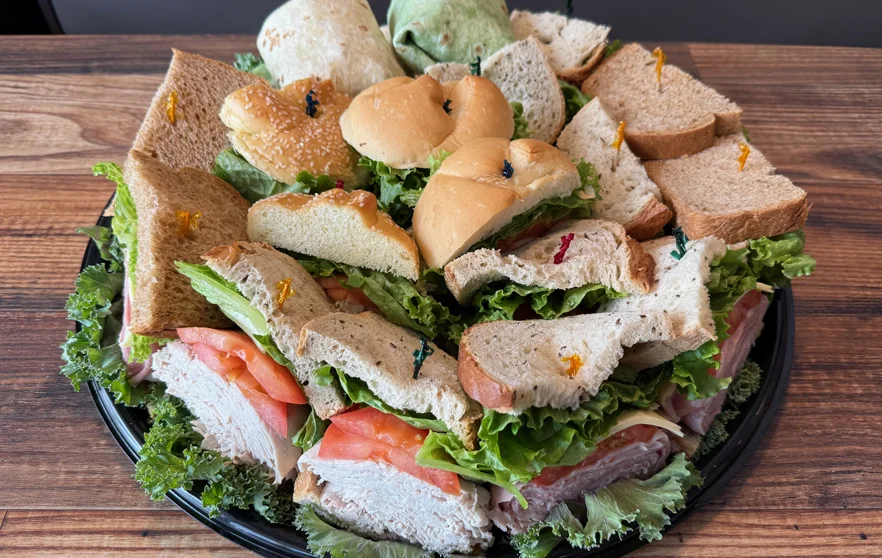 Catering platter with assorted deli sandwich wedges