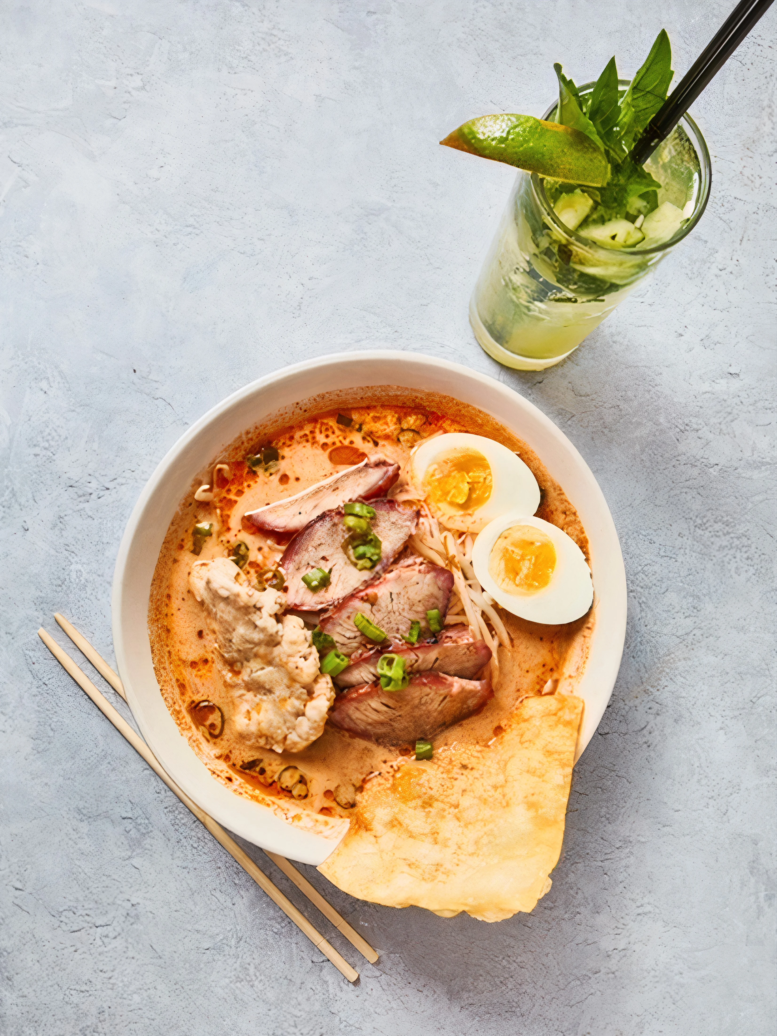 Bowl of Malaysian laksa with noodles and egg