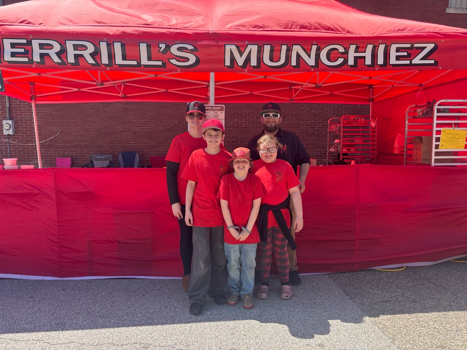 Family team at Merrill's Munchiez food stand
