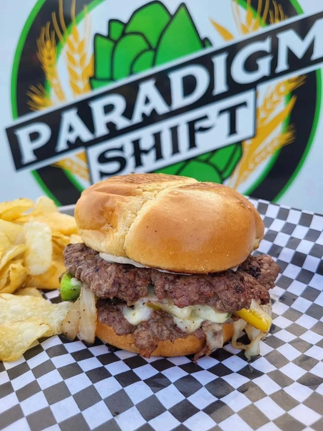 Hearty cheesesteak sandwich with crispy chips
