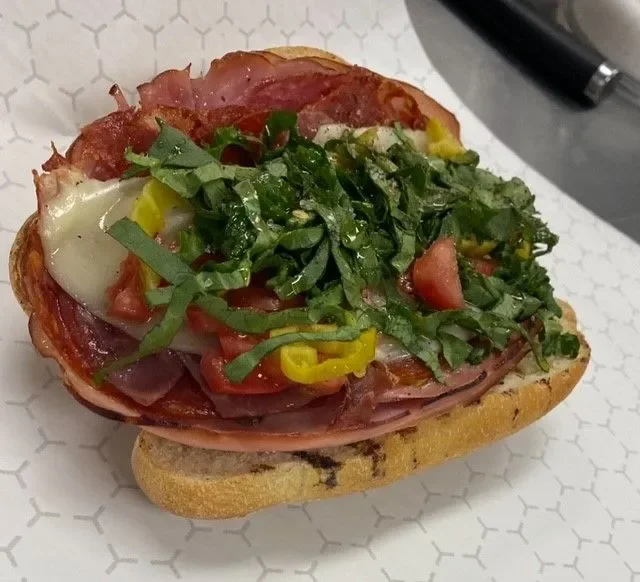 Italian sub sandwich loaded with meats and fresh toppings