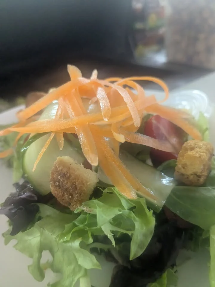 Fresh garden salad with colorful vegetables and crispy croutons