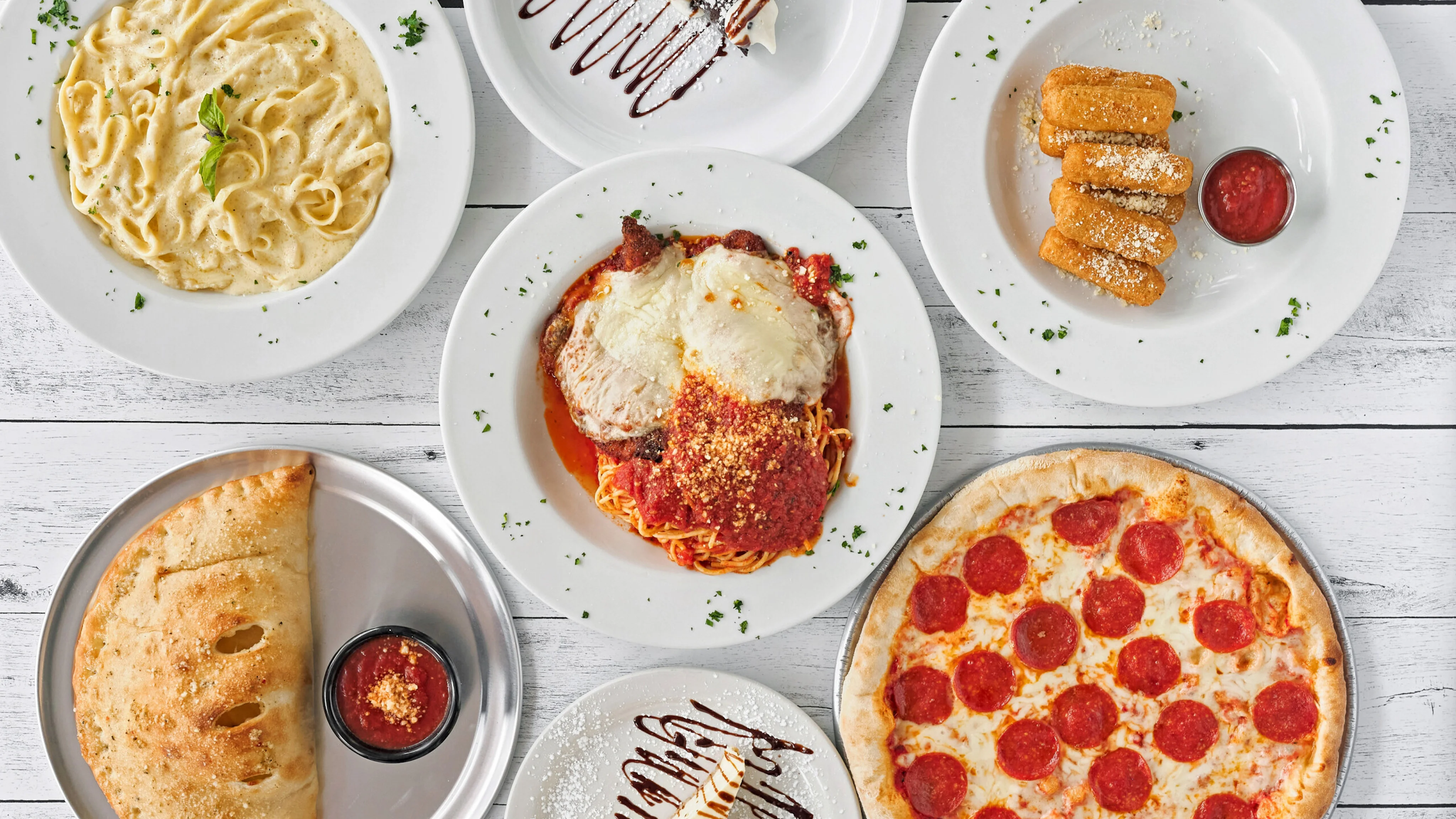 Pepperoni Pizza Calzone Chicken Parm Fettuccine Alfredo Mozzarella Sticks