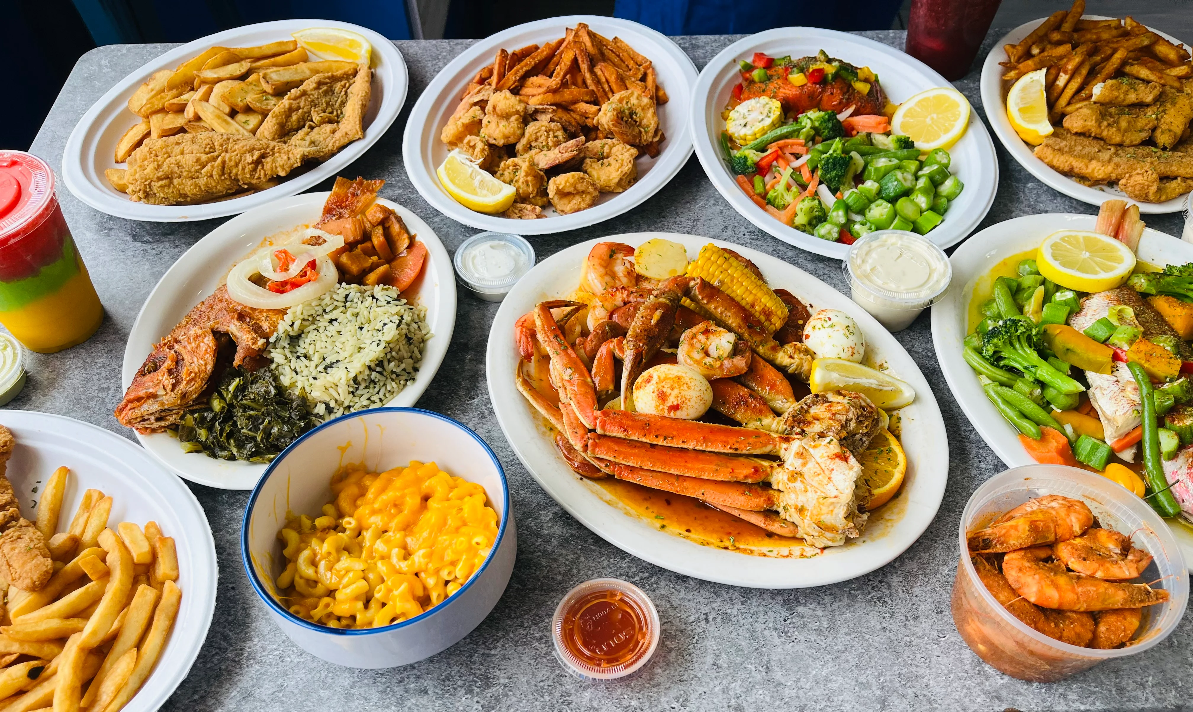 Seafood boil platter with crab, shrimp, and vegetables