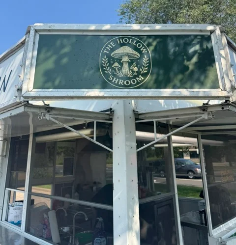 Food truck sign for The Hollow Shroom, specializing in mushroom dishes