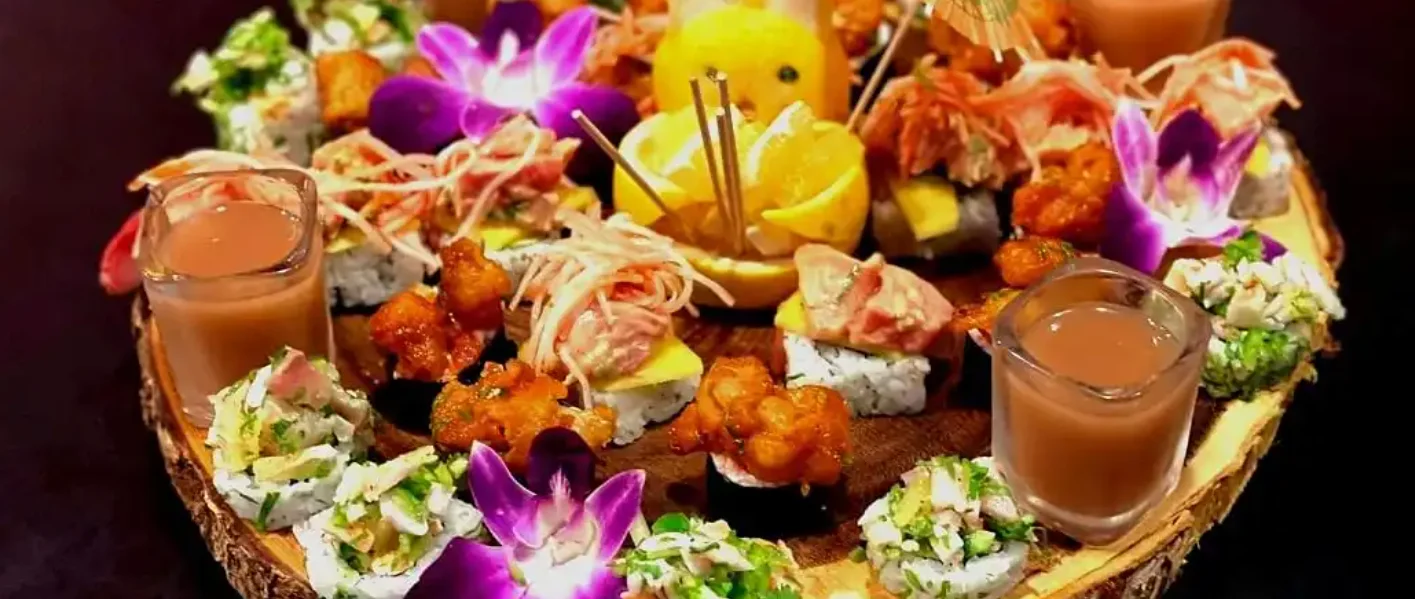Artistic sushi platter with vibrant garnishes