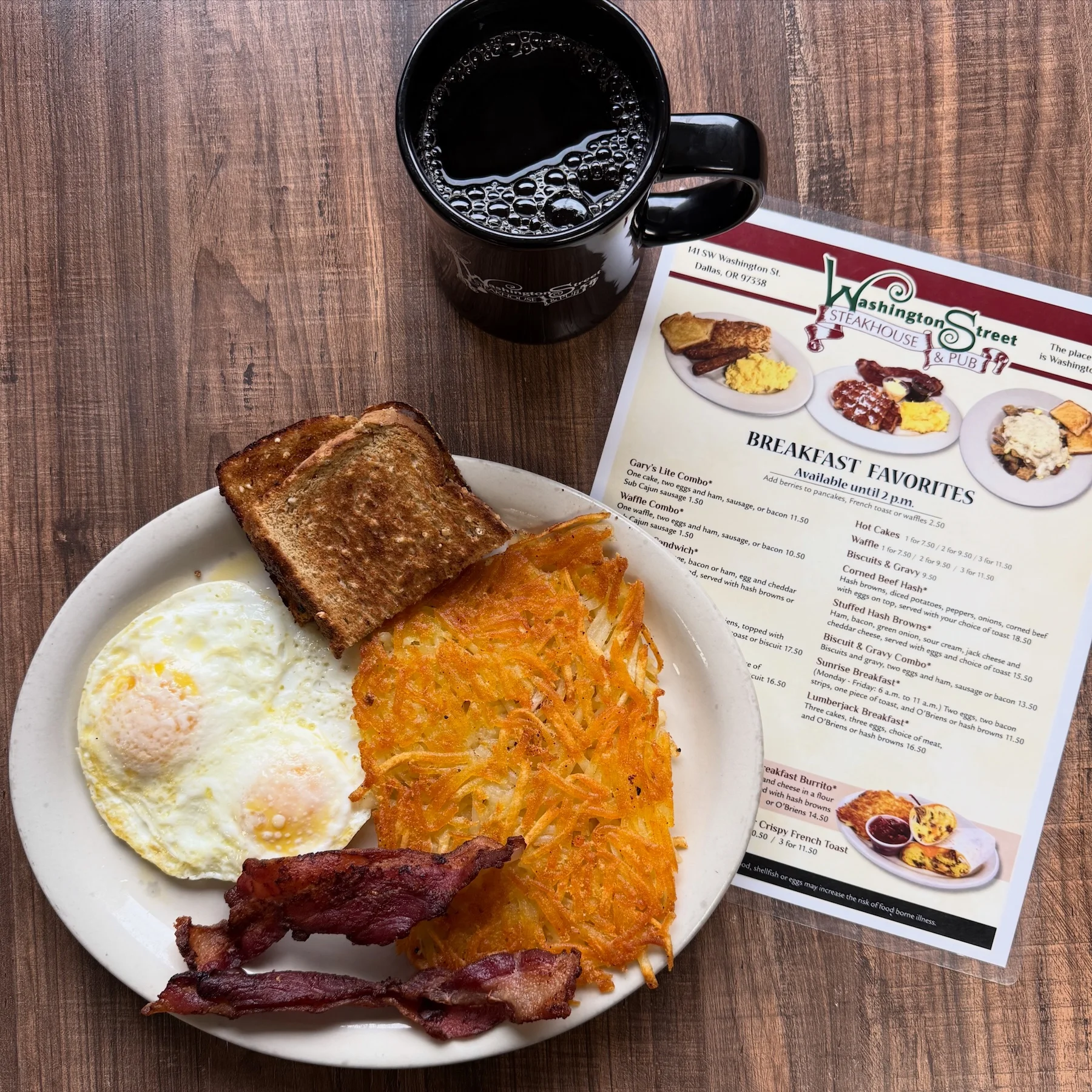 Classic American breakfast with eggs, bacon, and hash browns