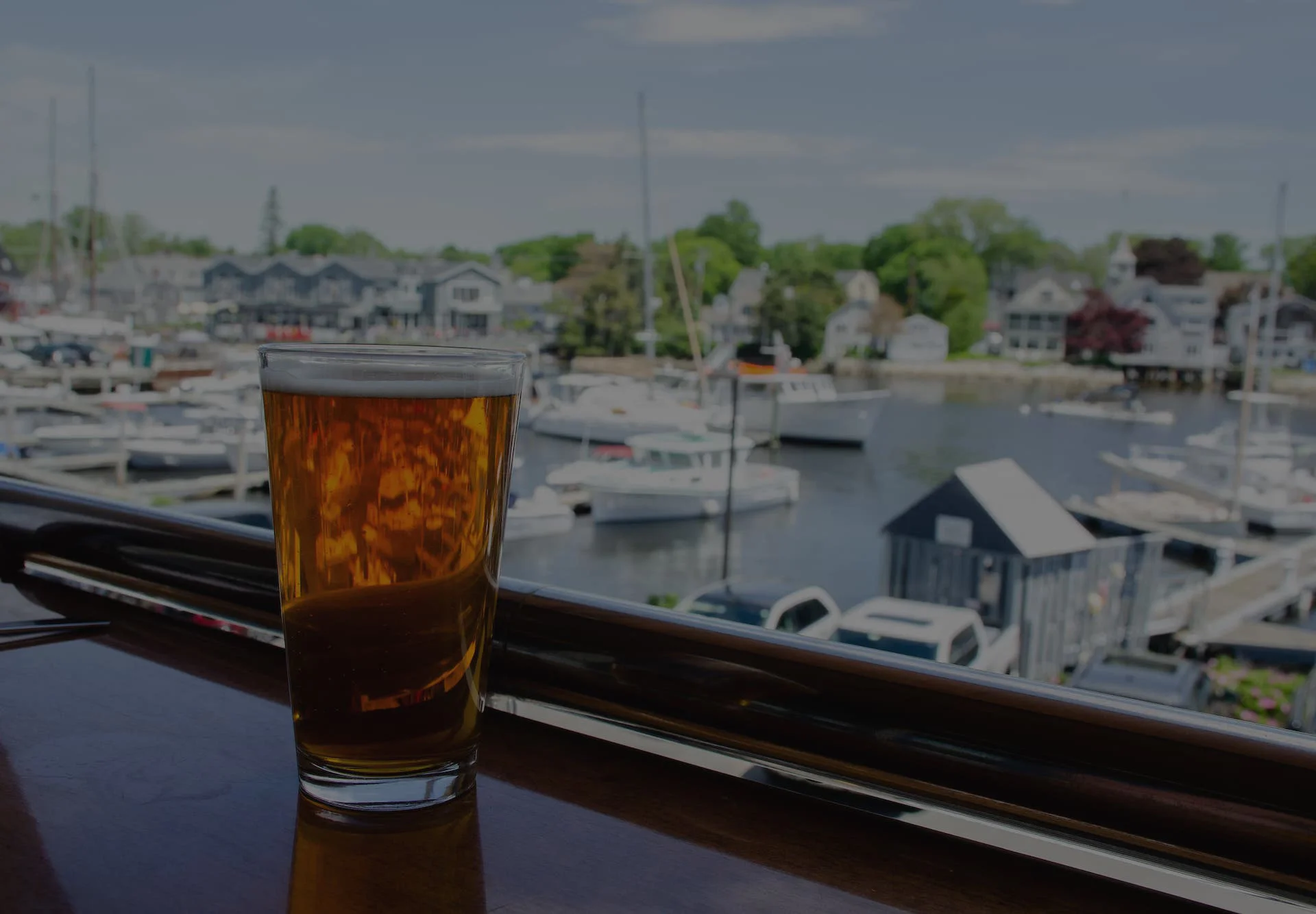 Refreshing beer with a marina view in a cozy restaurant