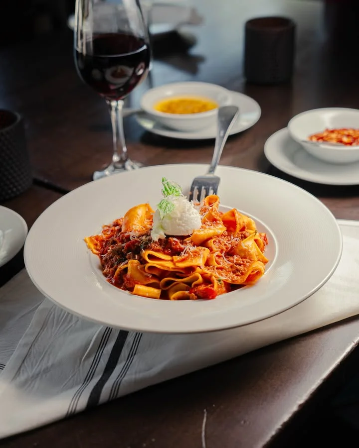 Elegant glass on a tray in a cozy restaurant setting