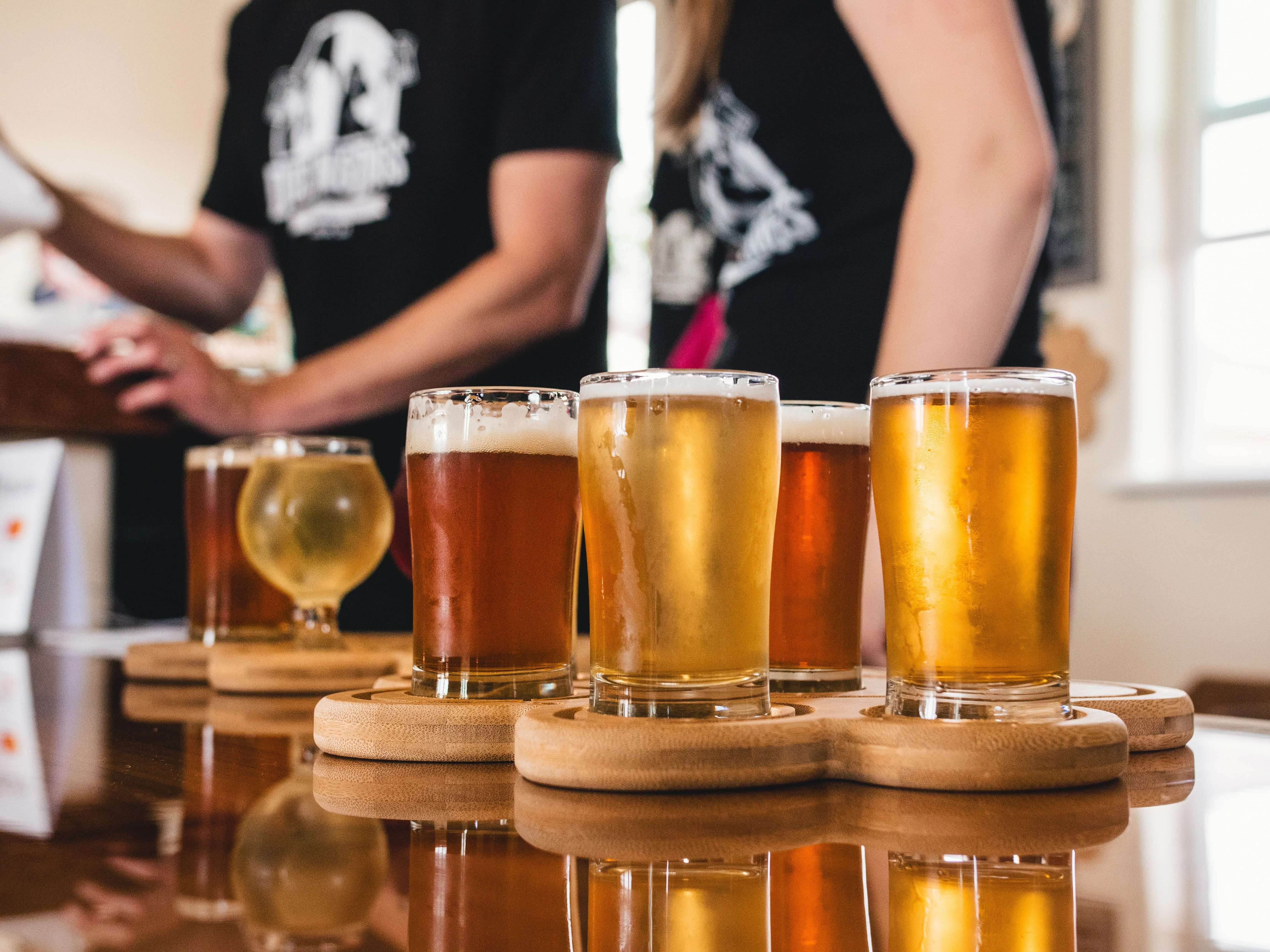 Several beers in a craft brewery environment