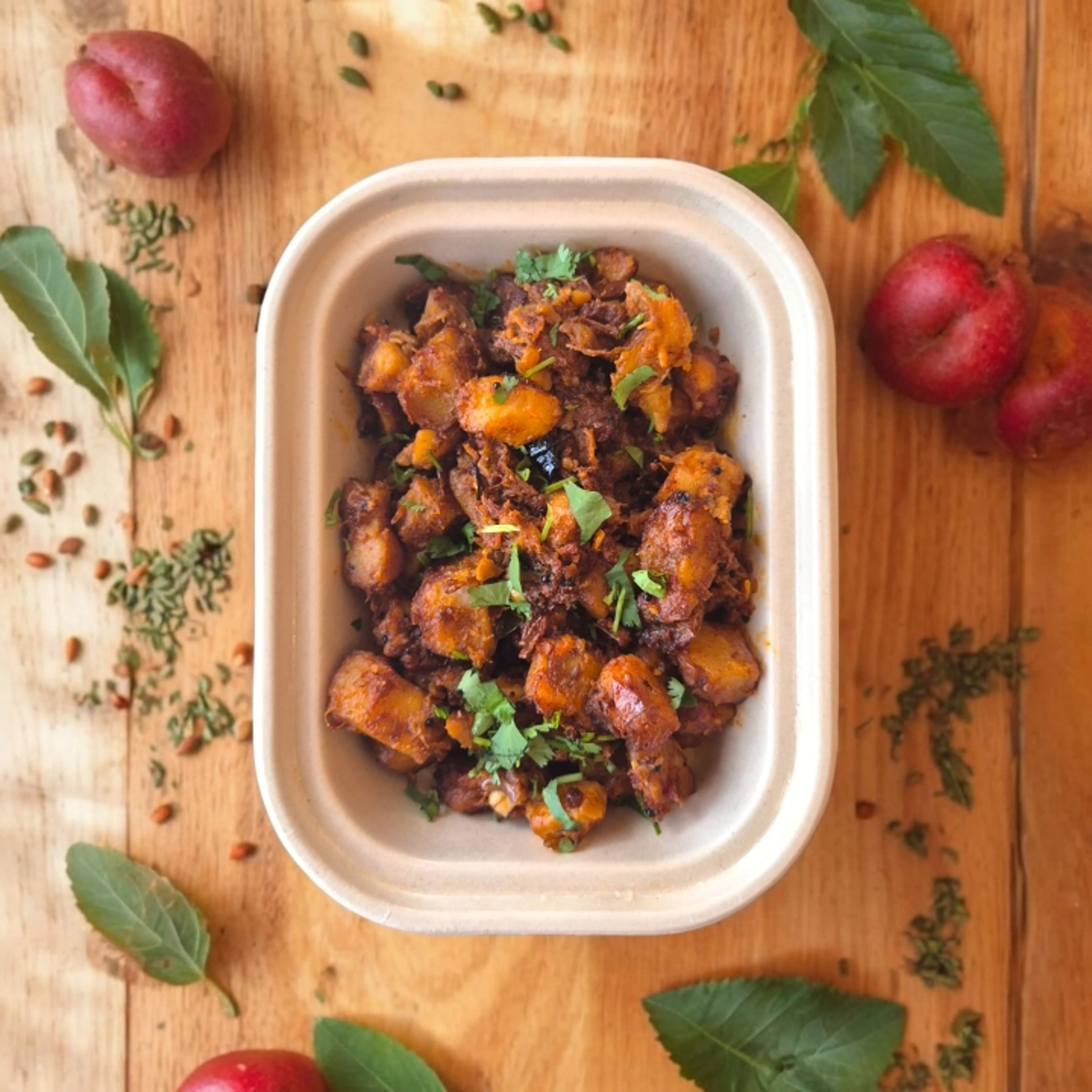 Spicy Indian-style sweet potato chaat with fresh herbs