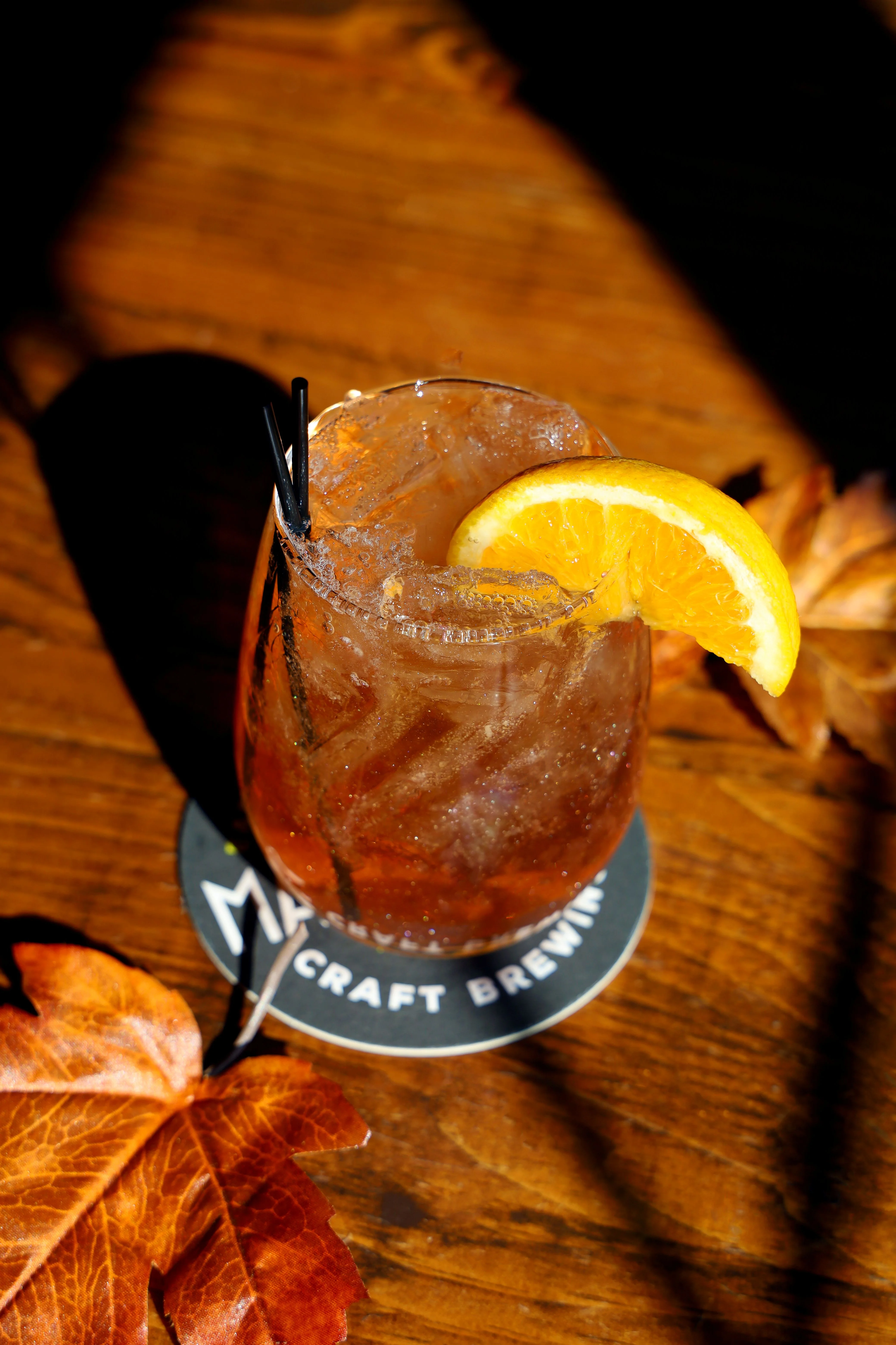 Craft cocktail served in a coupe glass with a unique garnish