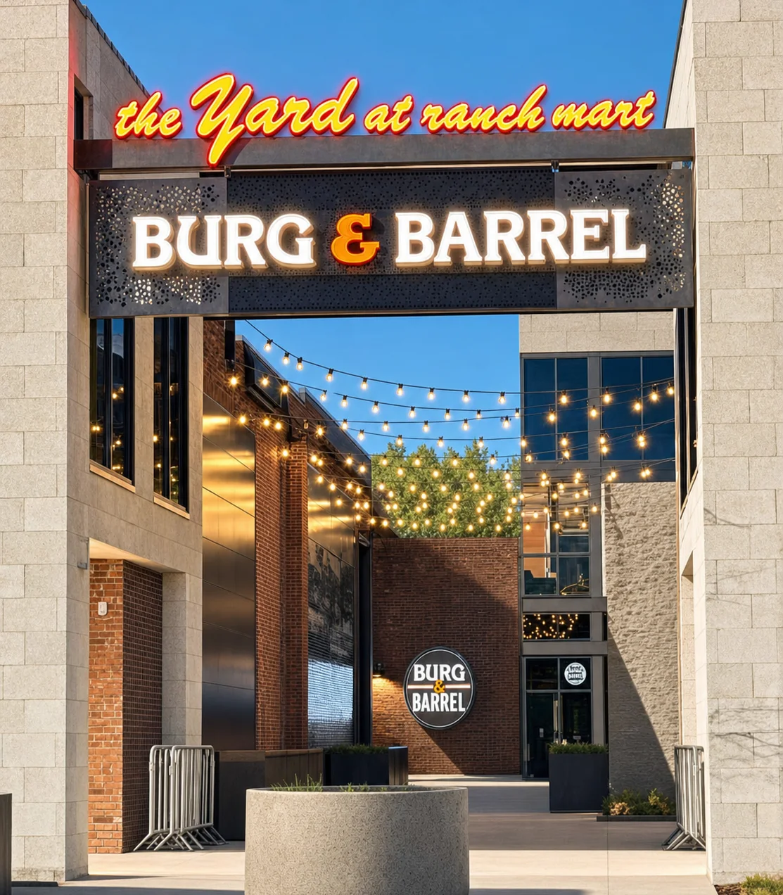 Entrance to Burg & Barrel restaurant at The Yard with string lights
