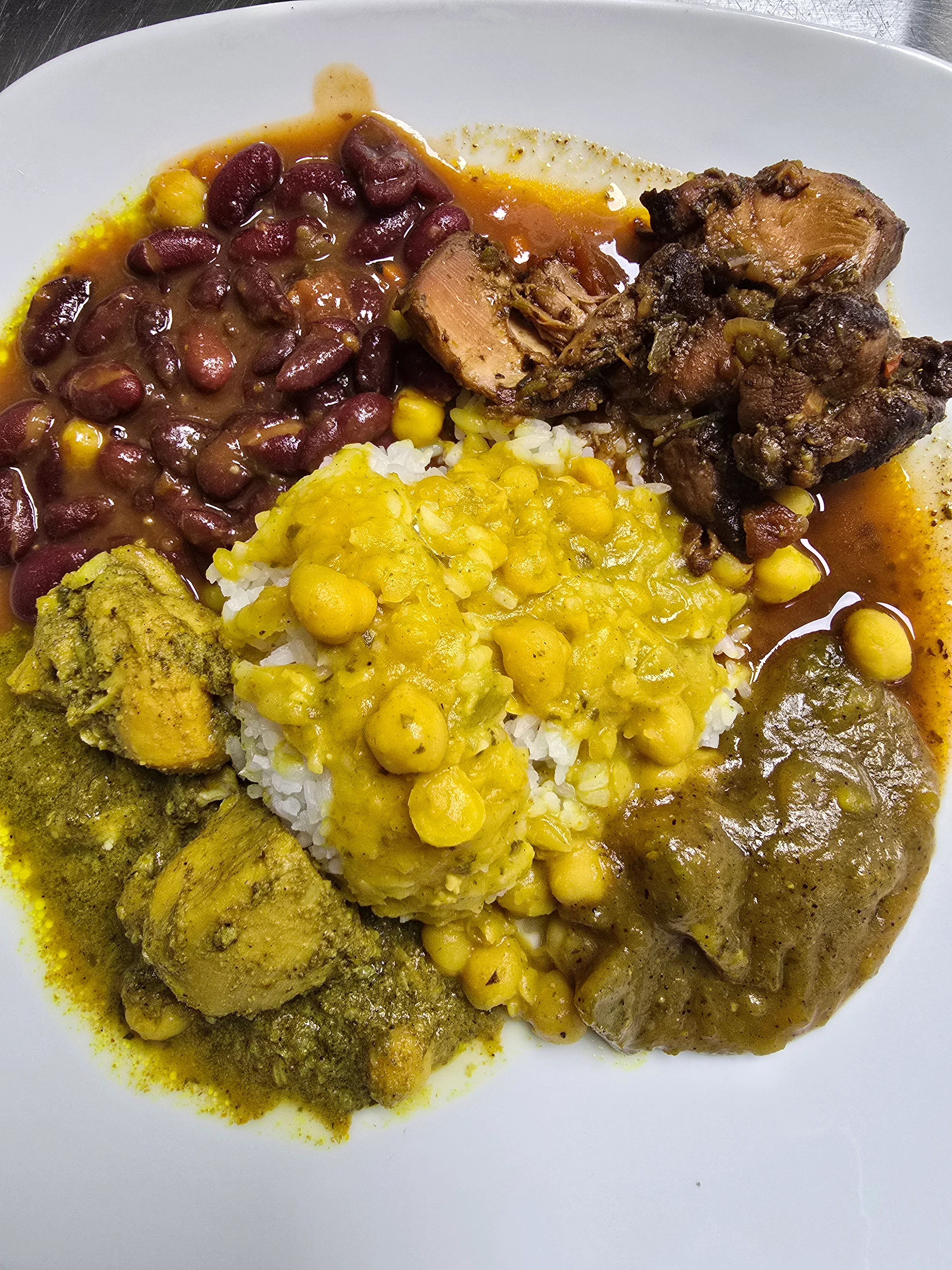 Caribbean plate with rice, beans, and spiced meats