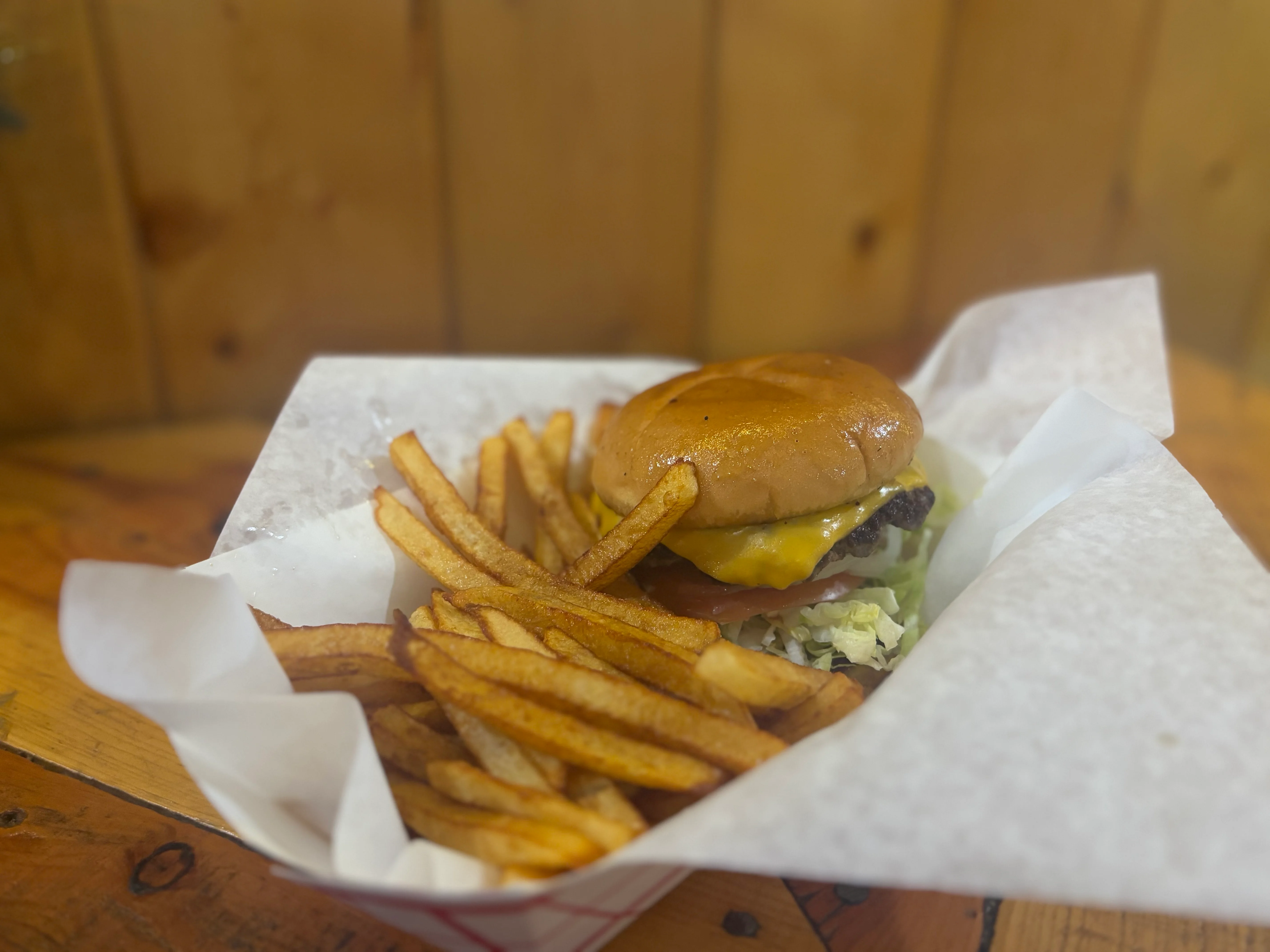 Classic American cheeseburger with fries