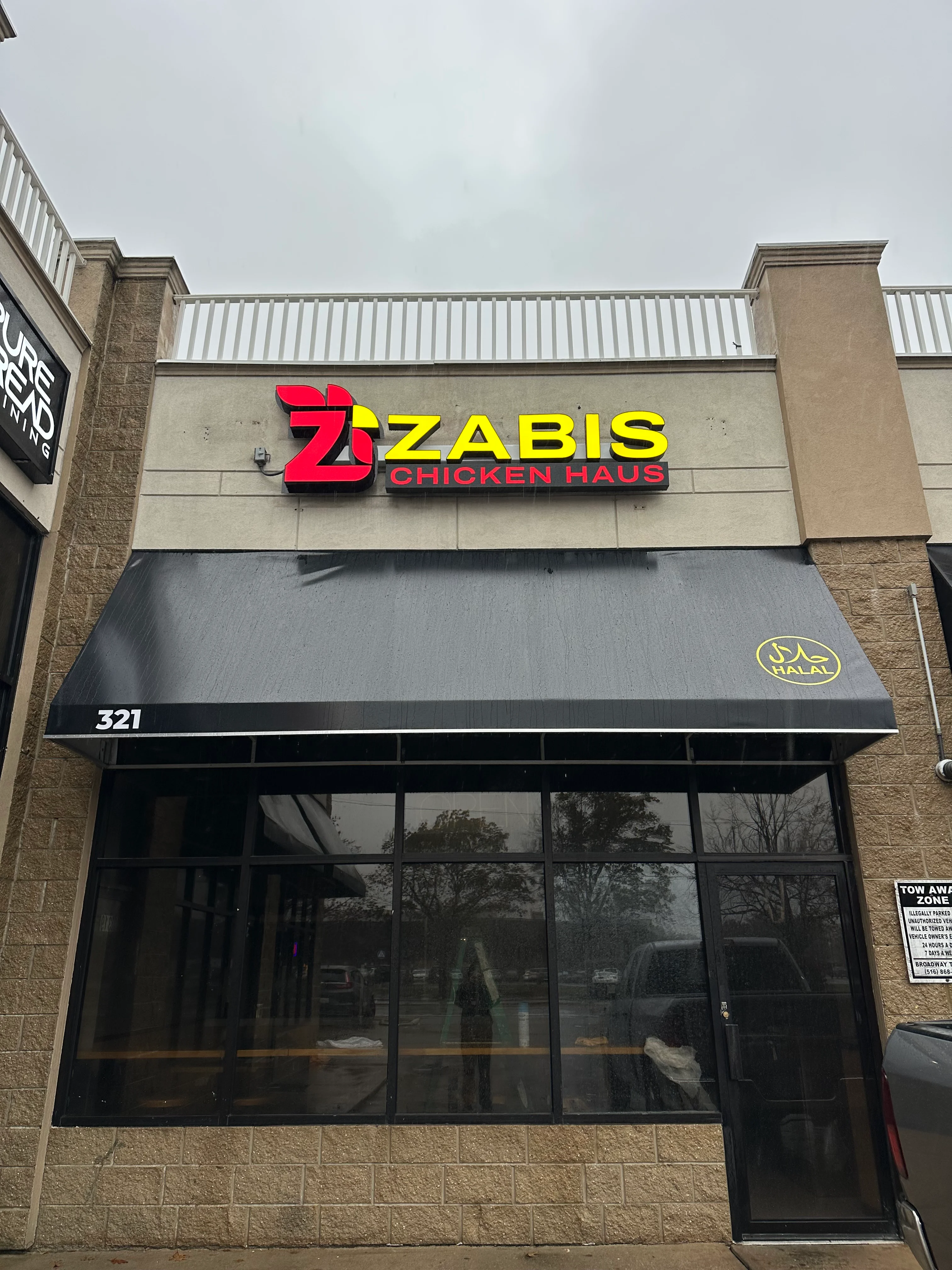 Zabis Chicken Haus restaurant exterior with signage