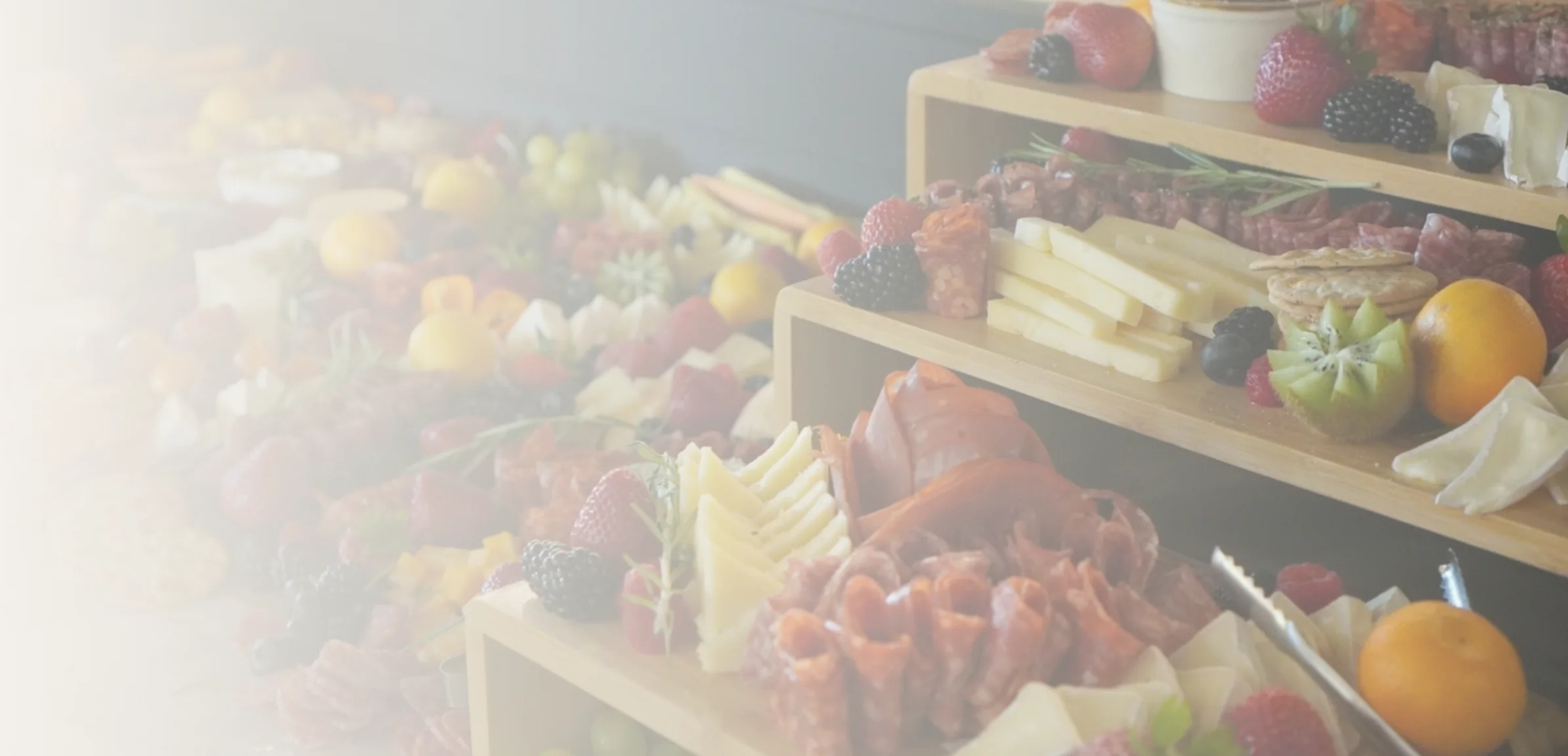 Artisan charcuterie board with assorted cheeses and fruits