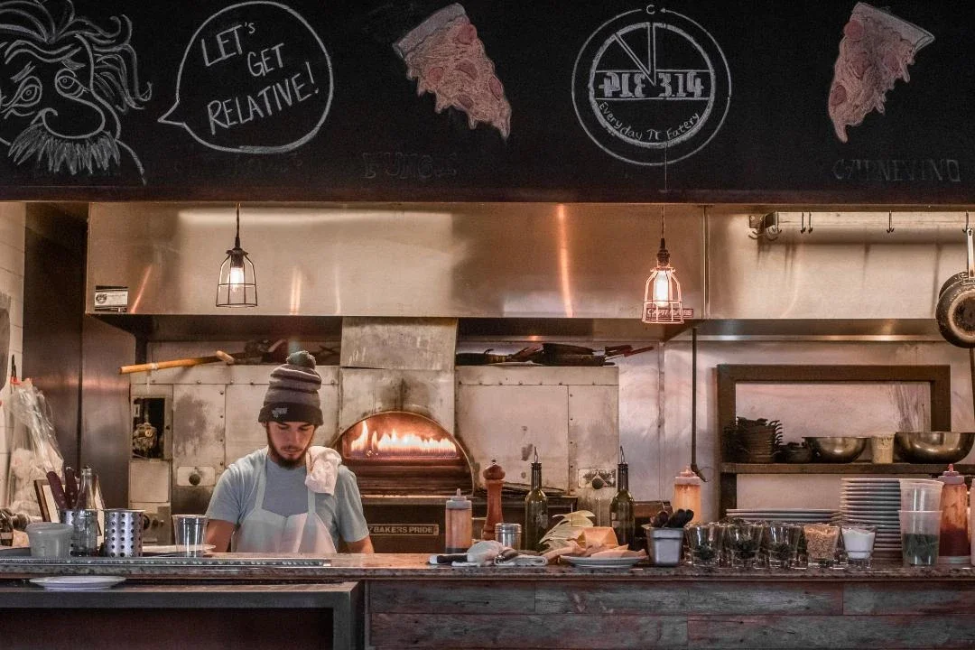 A restaurant chef preparing a dish
