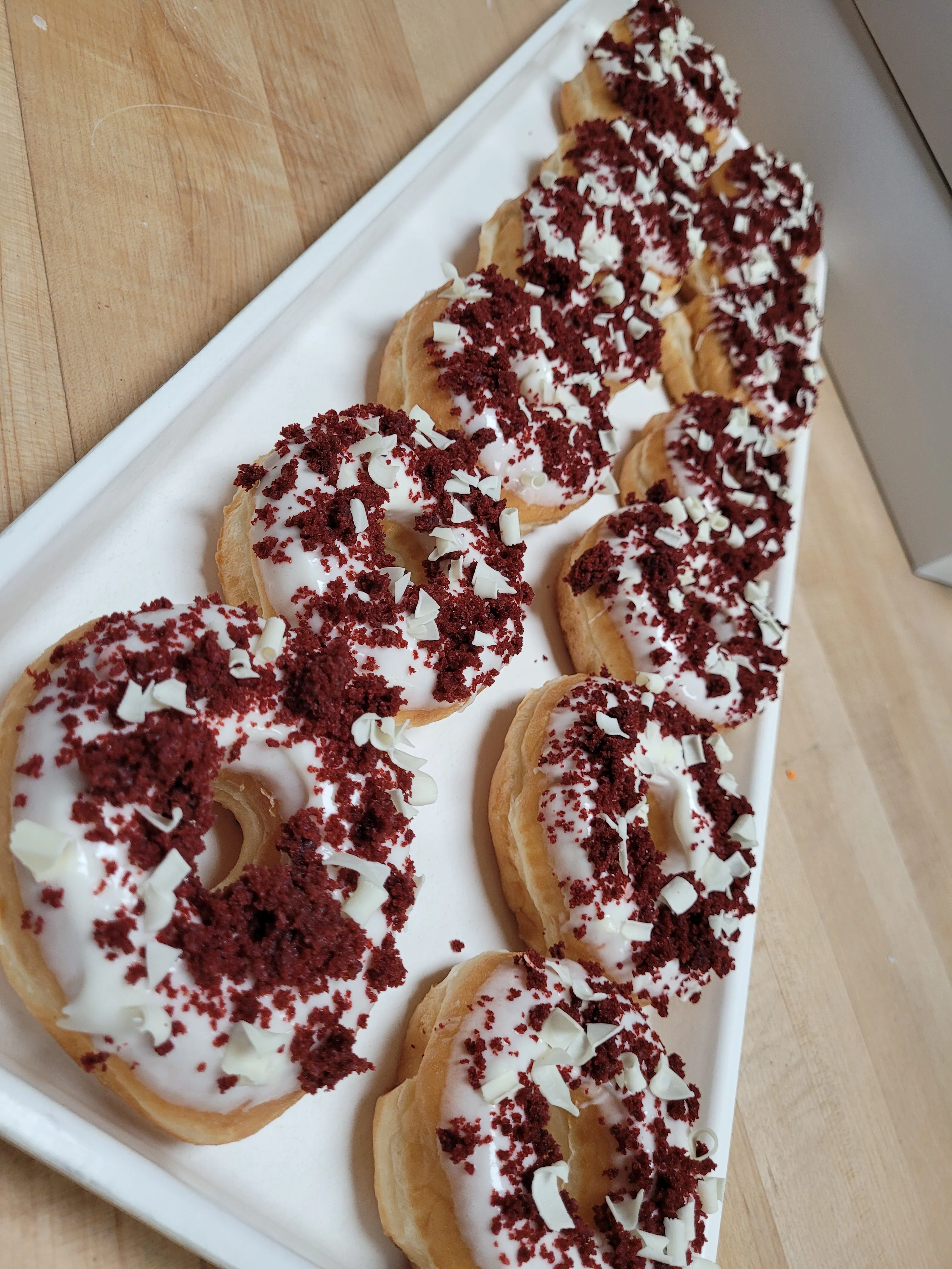 Red velvet donuts with cream cheese frosting