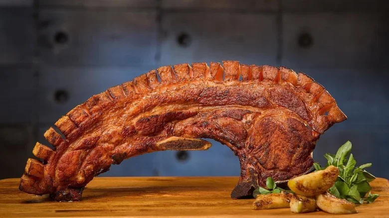 Crispy pork belly served on a wooden board