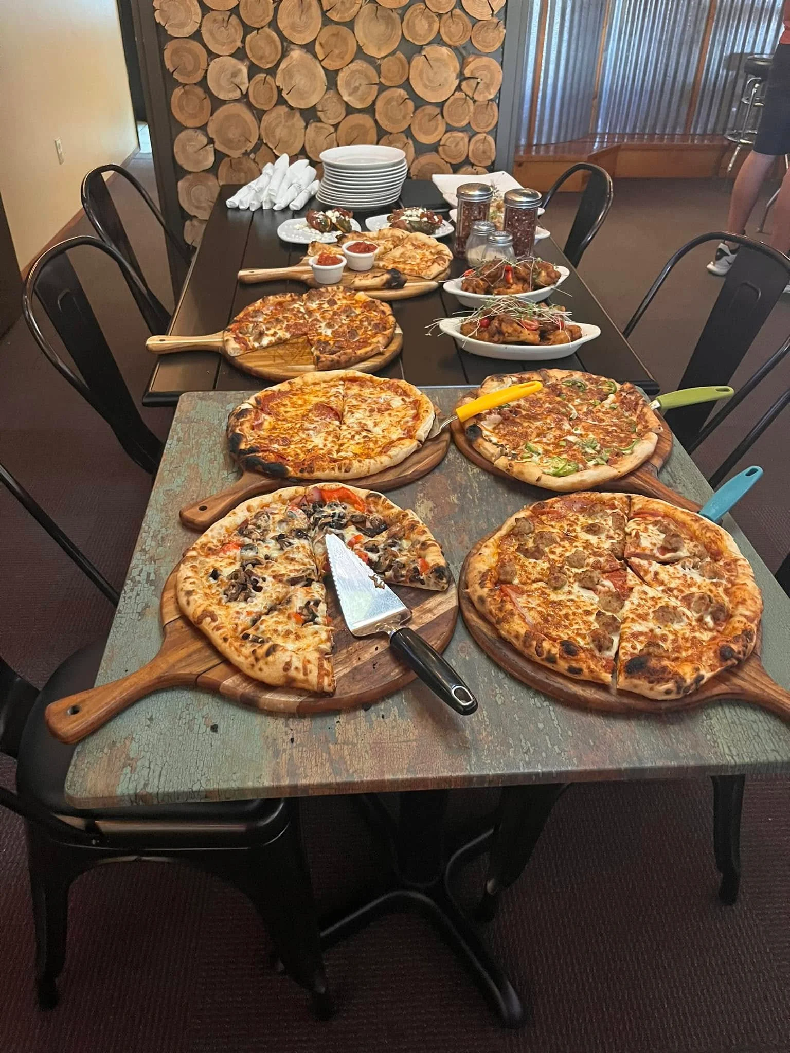 An array of pizzas for a catering event