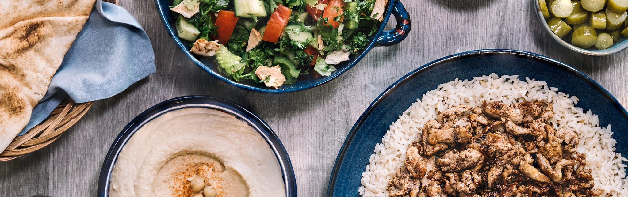 Middle Eastern chicken shawarma served with rice and salad