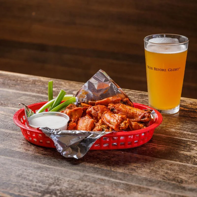 Delicious crispy chicken wings served with dipping sauce