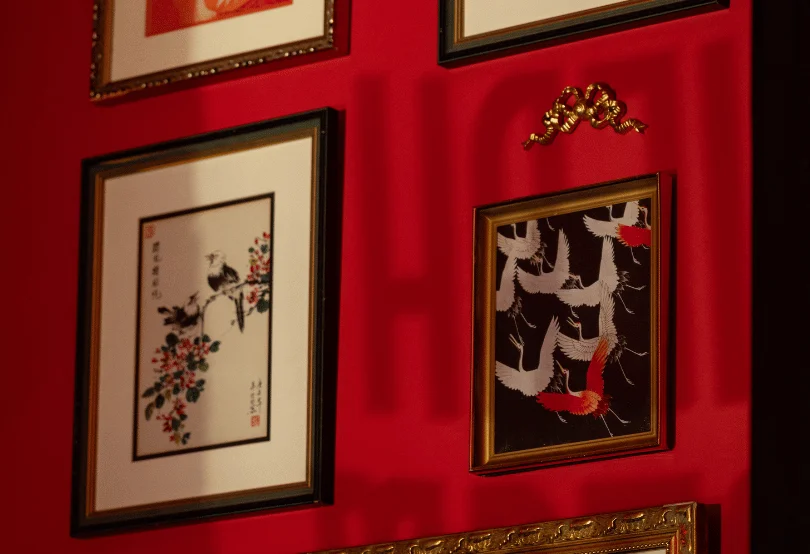 Colorful logo of SongBirds restaurant featuring a bird design.