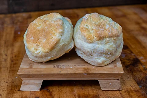 Flaky Southern-style biscuits on a wooden board