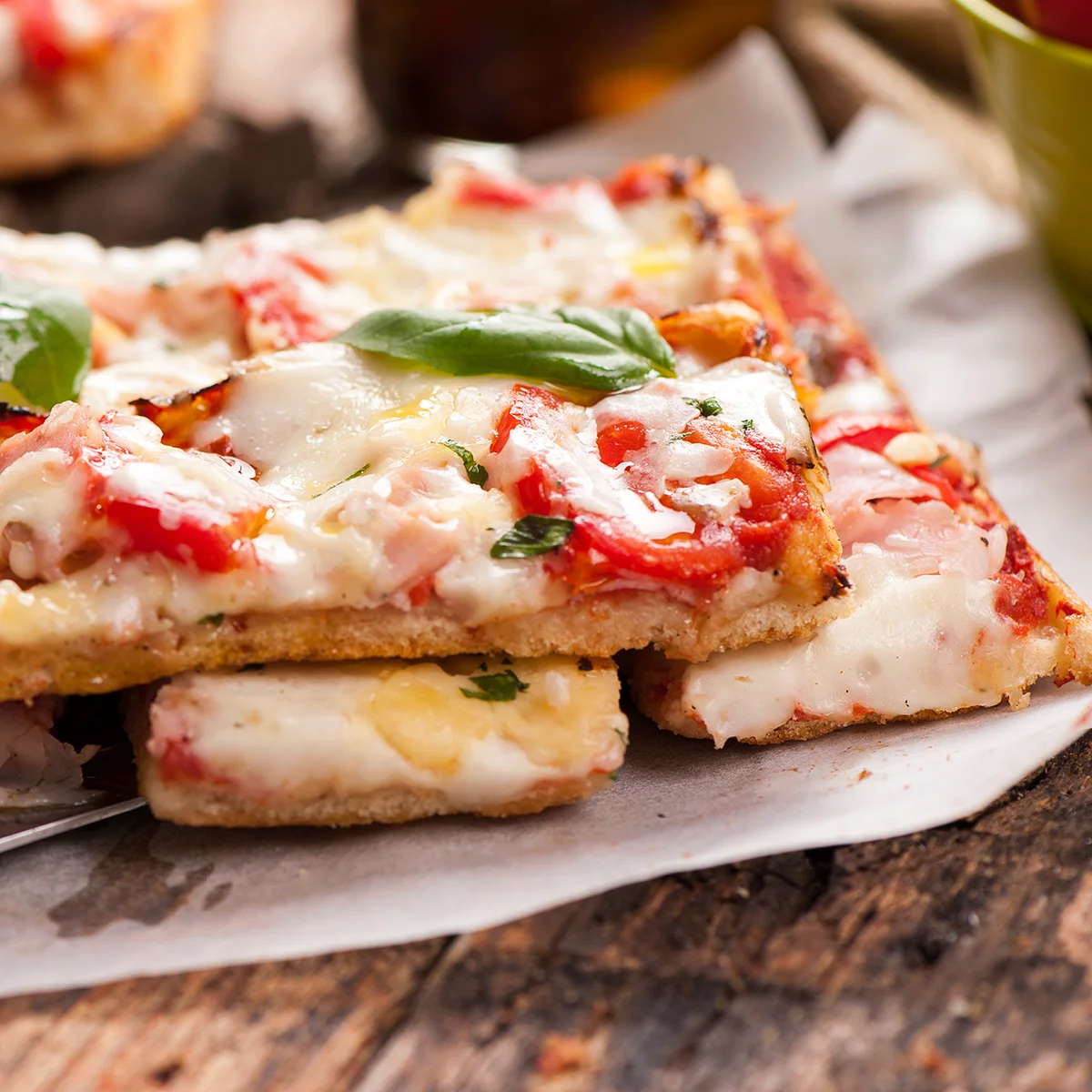 Delicious Margherita pizza with fresh basil and melted cheese