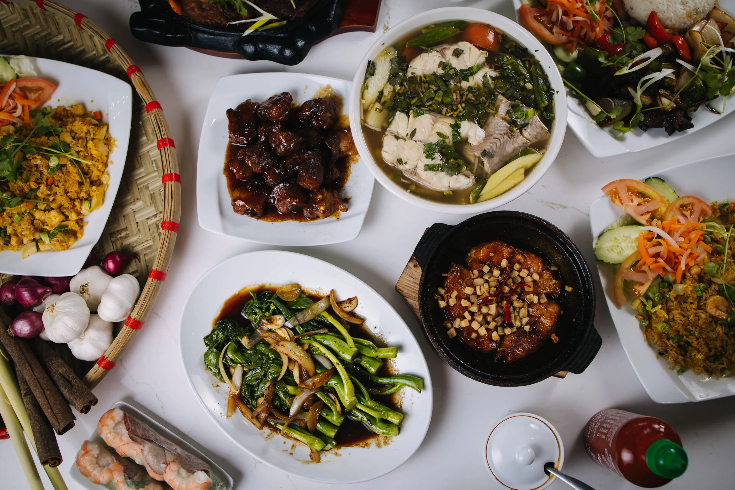 A beautifully arranged table with delicious dishes and drinks.