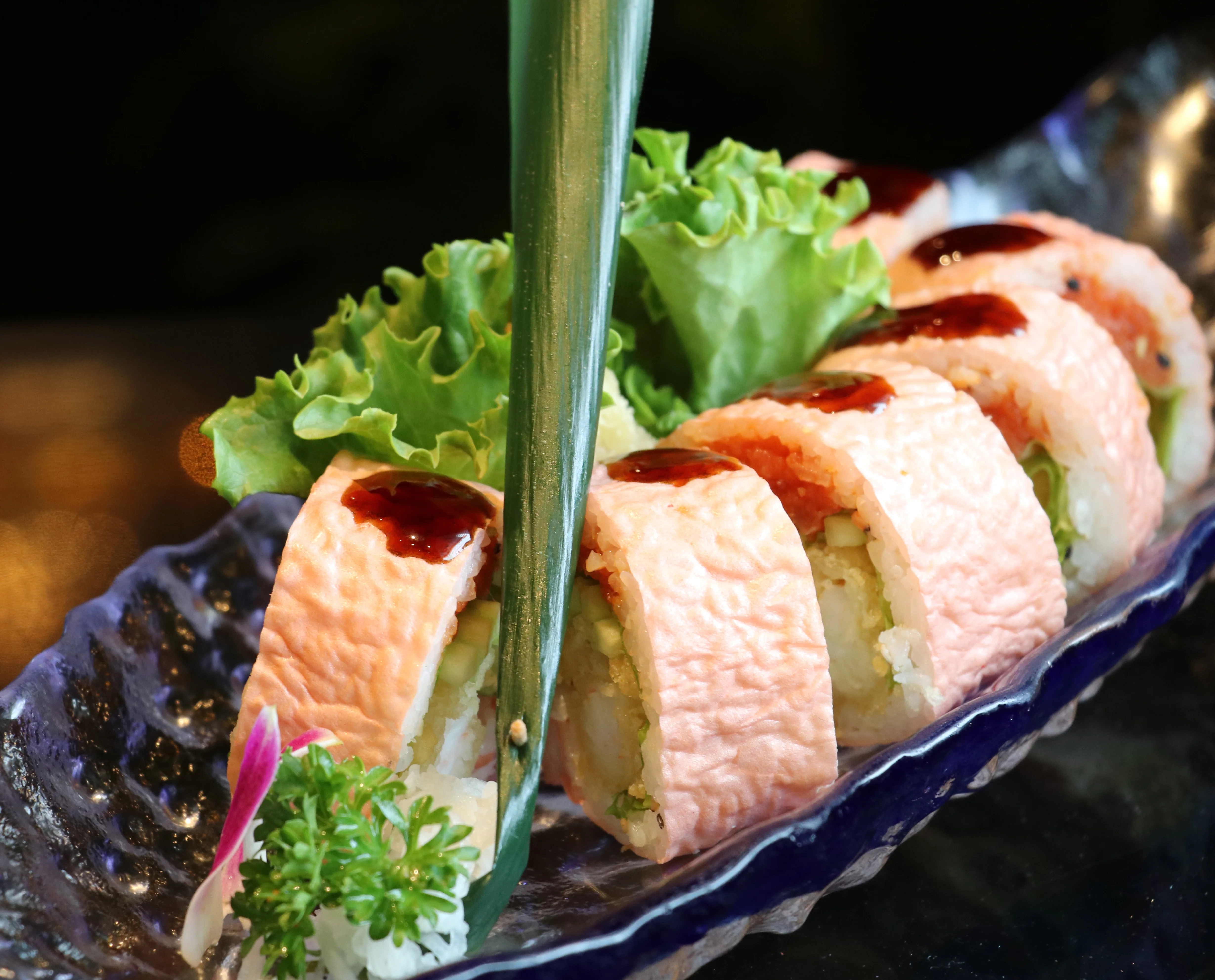 Japanese sushi rolls with shrimp and spicy sauce